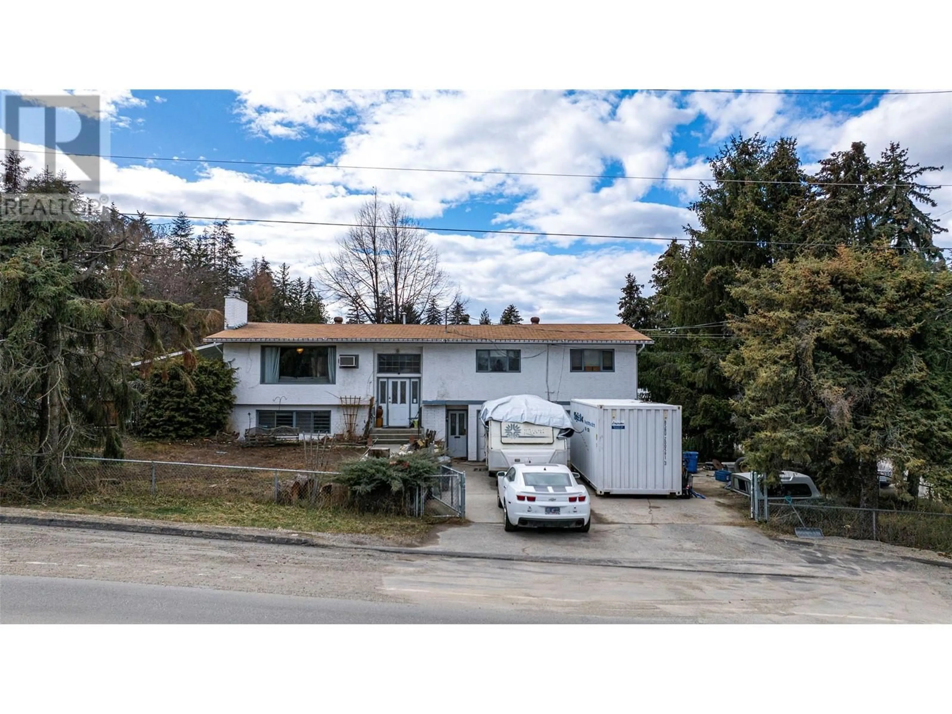 A pic from outside/outdoor area/front of a property/back of a property/a pic from drone, street for 7510 MCCLOUNIE ROAD, Coldstream British Columbia V1B1P7