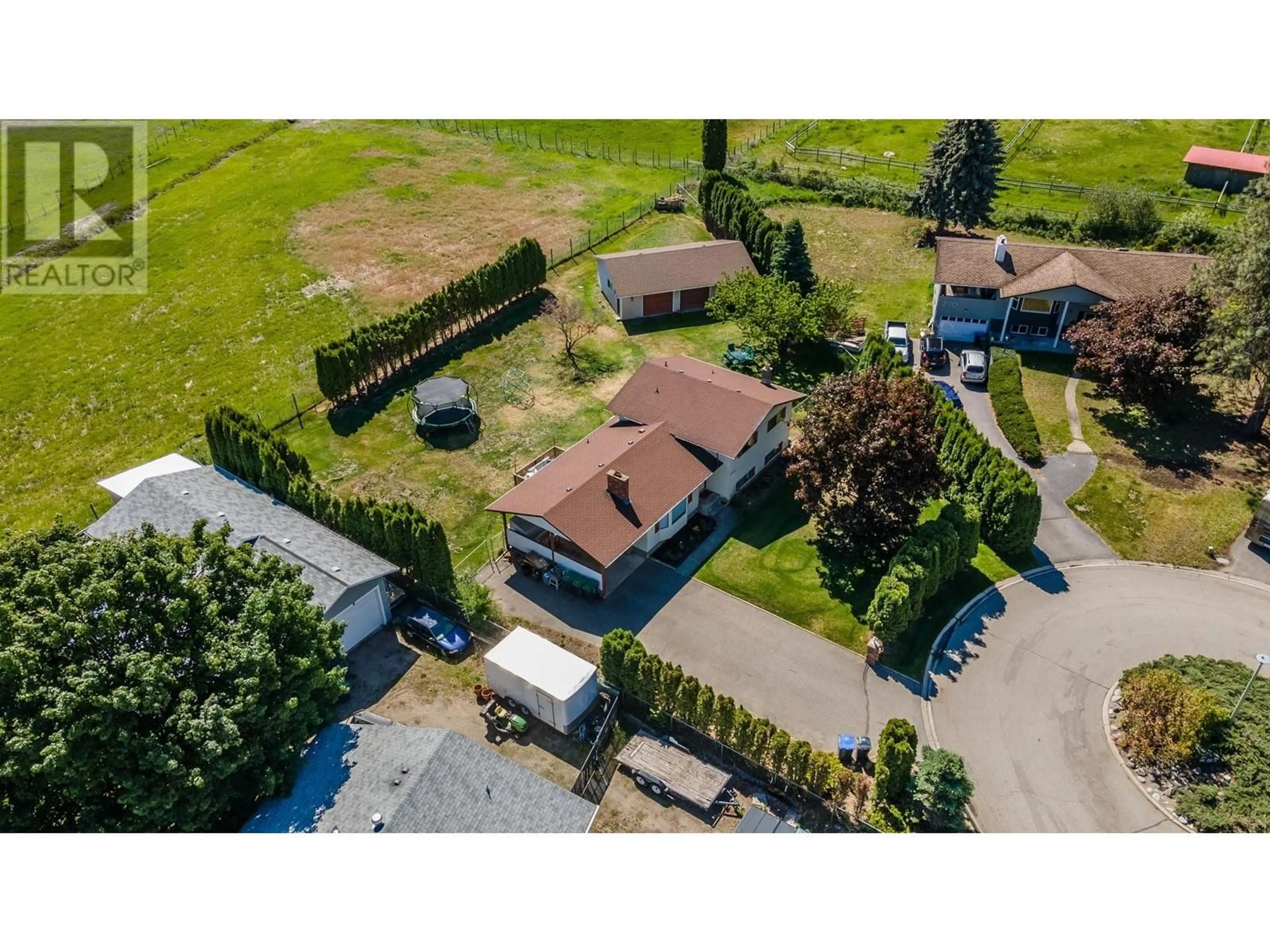 A pic from outside/outdoor area/front of a property/back of a property/a pic from drone, street for 2160 DIAMOND ROAD, Kelowna British Columbia V1W4B9