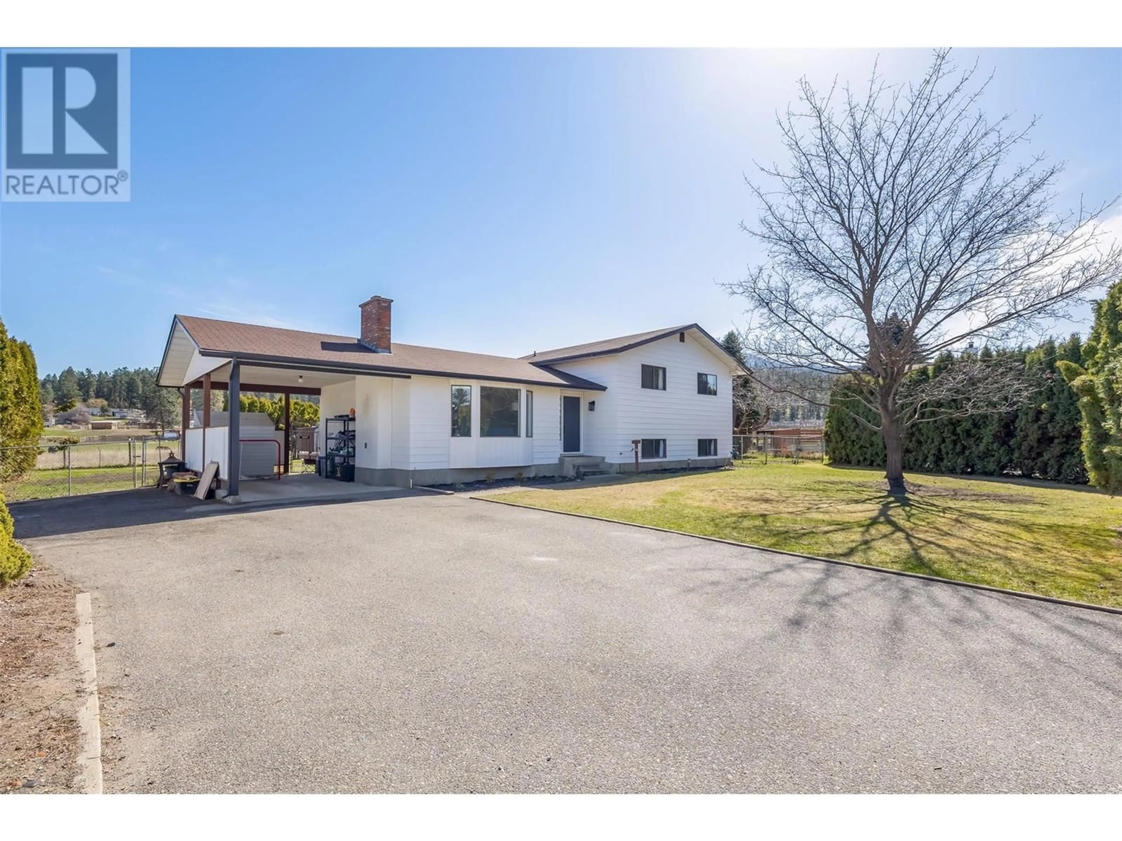A pic from outside/outdoor area/front of a property/back of a property/a pic from drone, street for 2160 DIAMOND ROAD, Kelowna British Columbia V1W4B9