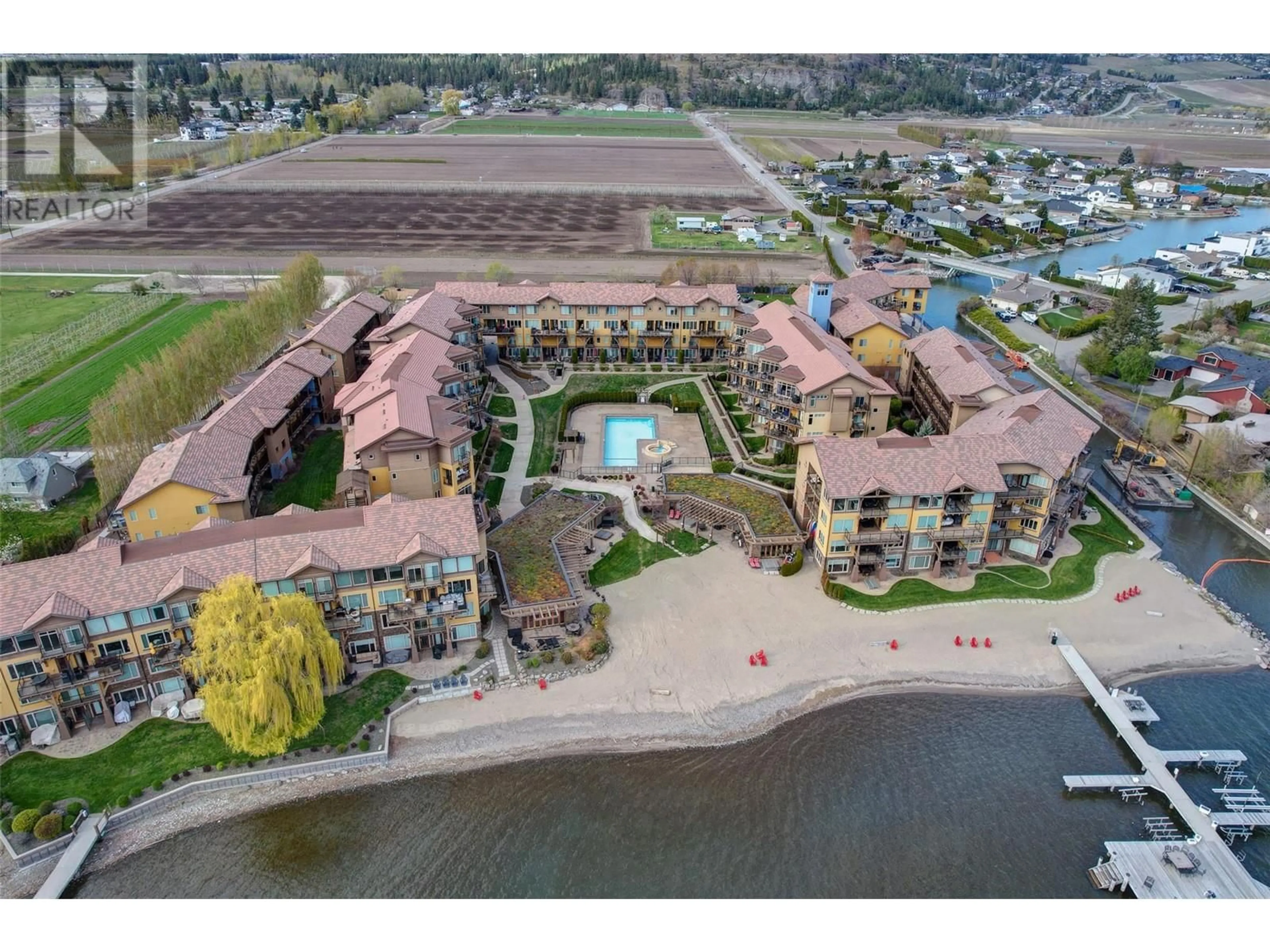 A pic from outside/outdoor area/front of a property/back of a property/a pic from drone, water/lake/river/ocean view for 8205 - 4028 PRITCHARD DRIVE, West Kelowna British Columbia V4T2N6
