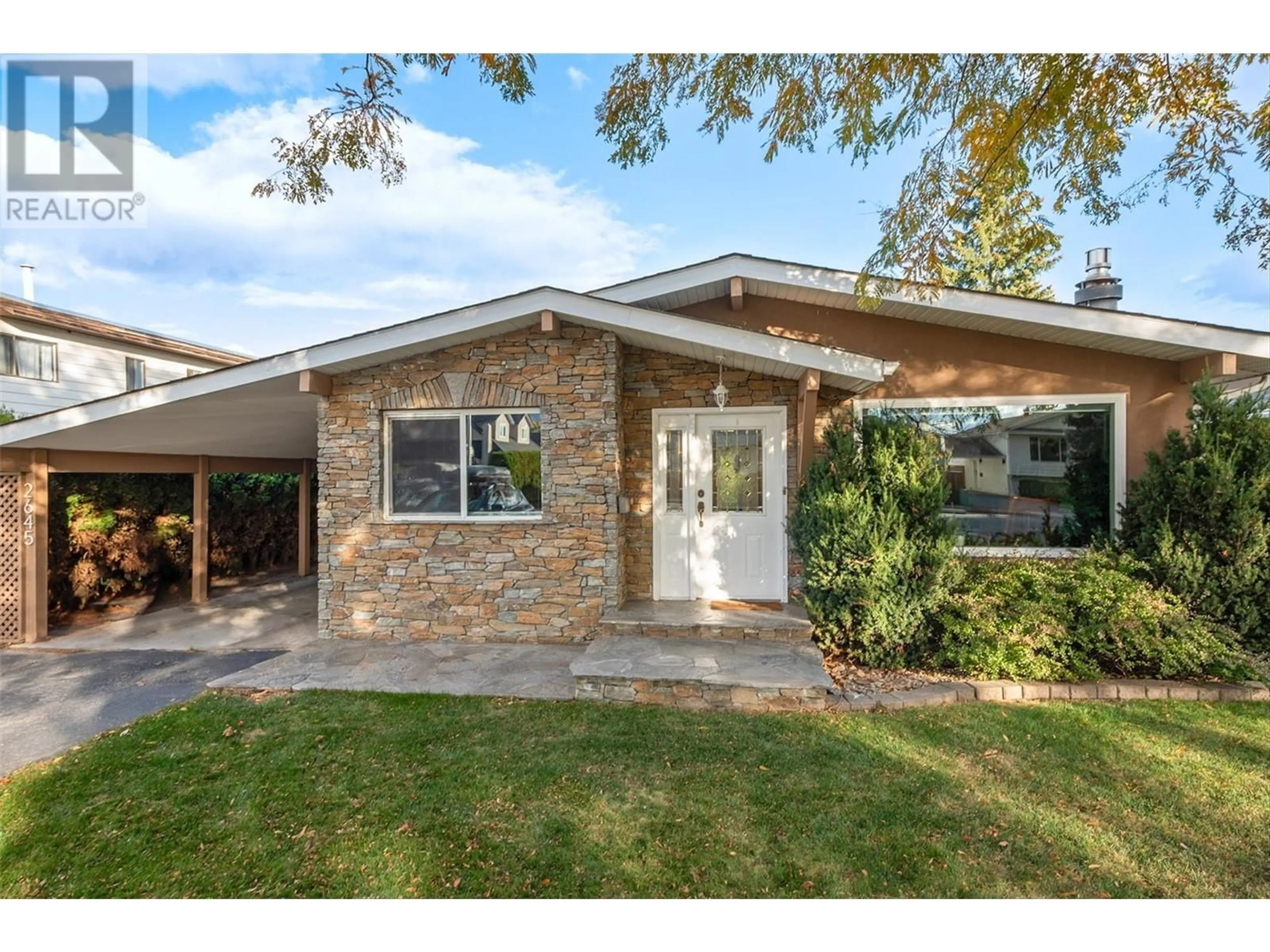 Home with brick exterior material, street for 2645 ETHEL STREET, Kelowna British Columbia V1Y8C4