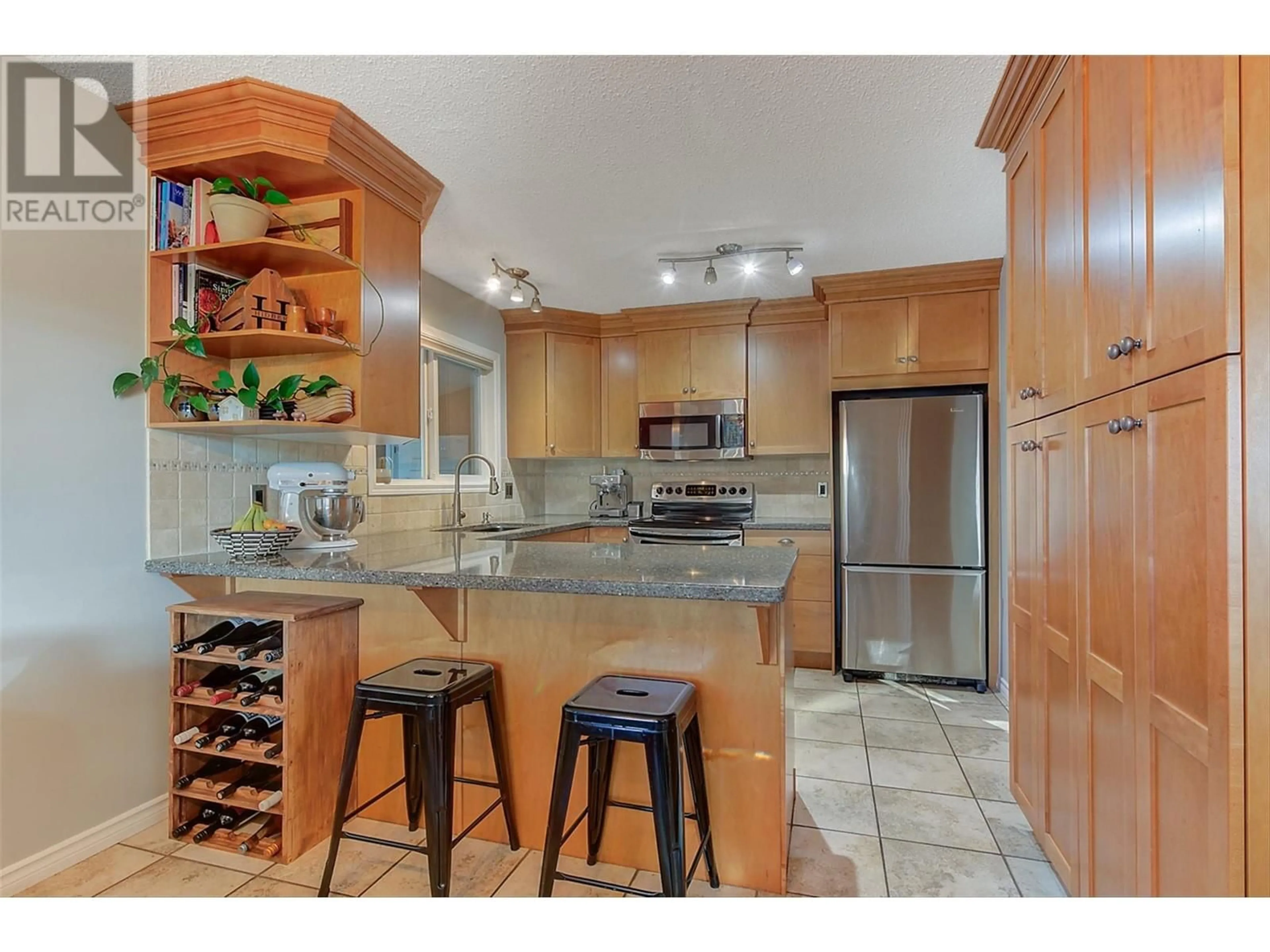 Open concept kitchen, ceramic/tile floor for 2645 ETHEL STREET, Kelowna British Columbia V1Y8C4