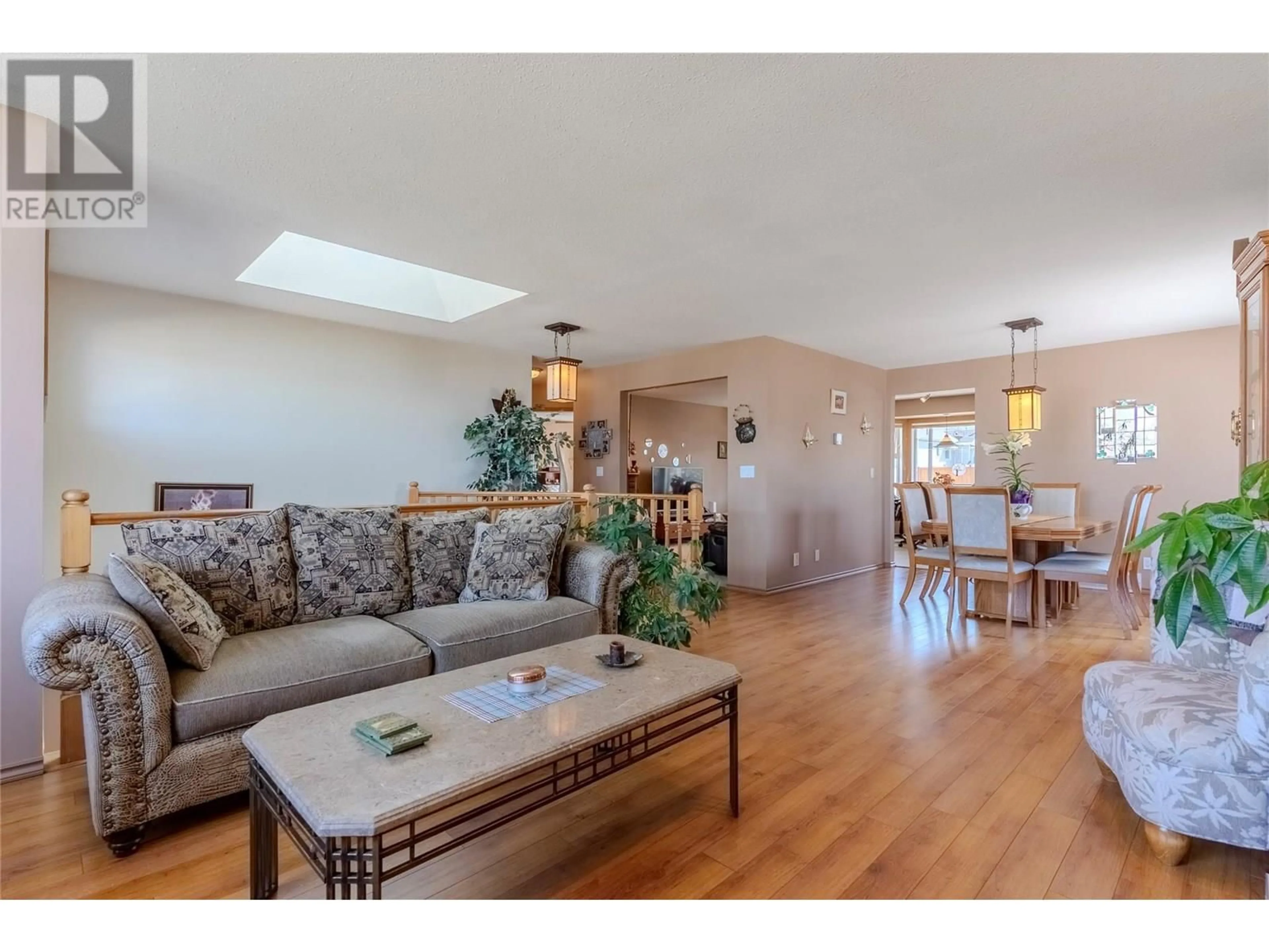 Living room with furniture, wood/laminate floor for 921 COLUMBIA STREET, Kamloops British Columbia V2C2V8