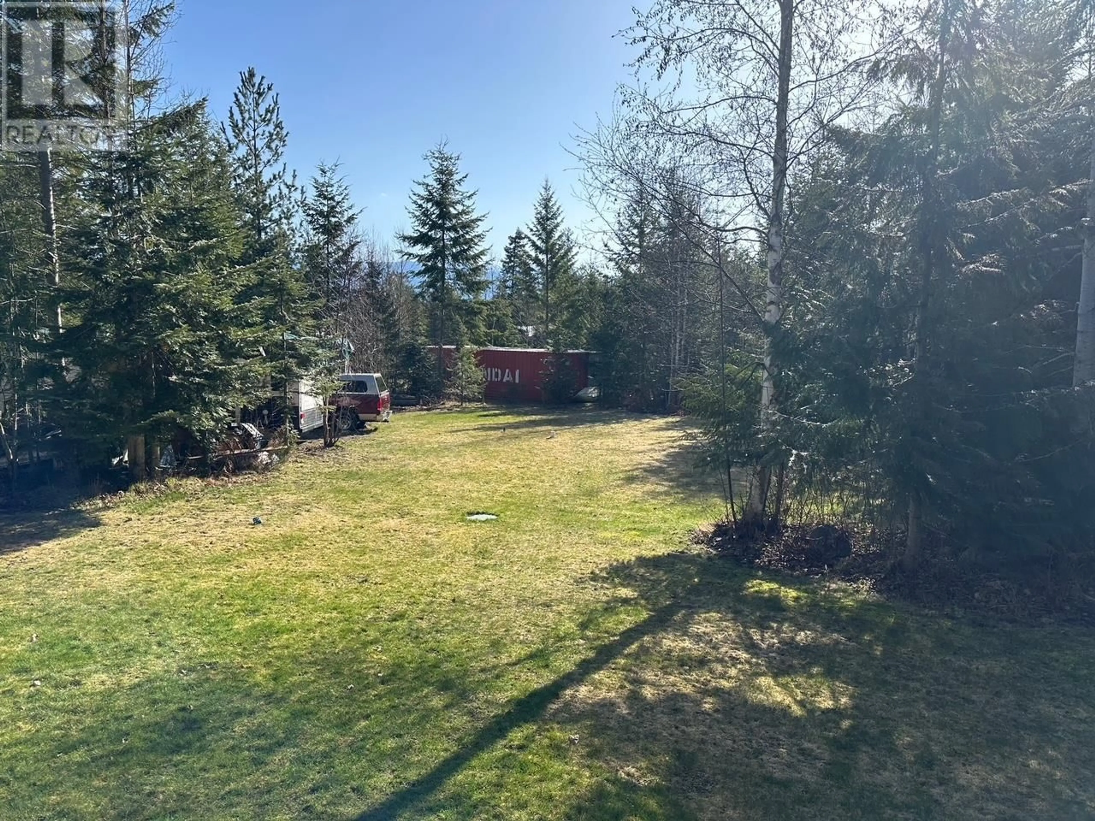 A pic from outside/outdoor area/front of a property/back of a property/a pic from drone, forest/trees view for 730 HEYLAND ROAD, Balfour British Columbia V0G1C0