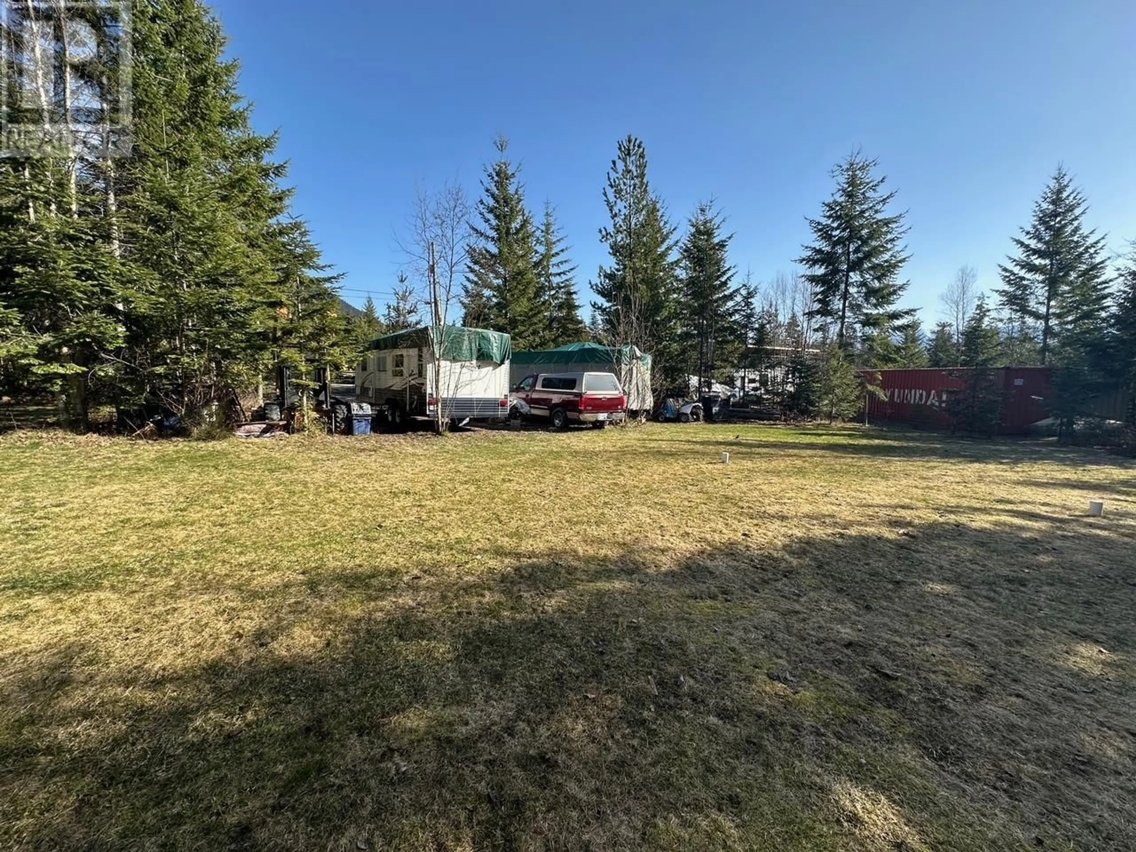 A pic from outside/outdoor area/front of a property/back of a property/a pic from drone, forest/trees view for 730 HEYLAND ROAD, Balfour British Columbia V0G1C0
