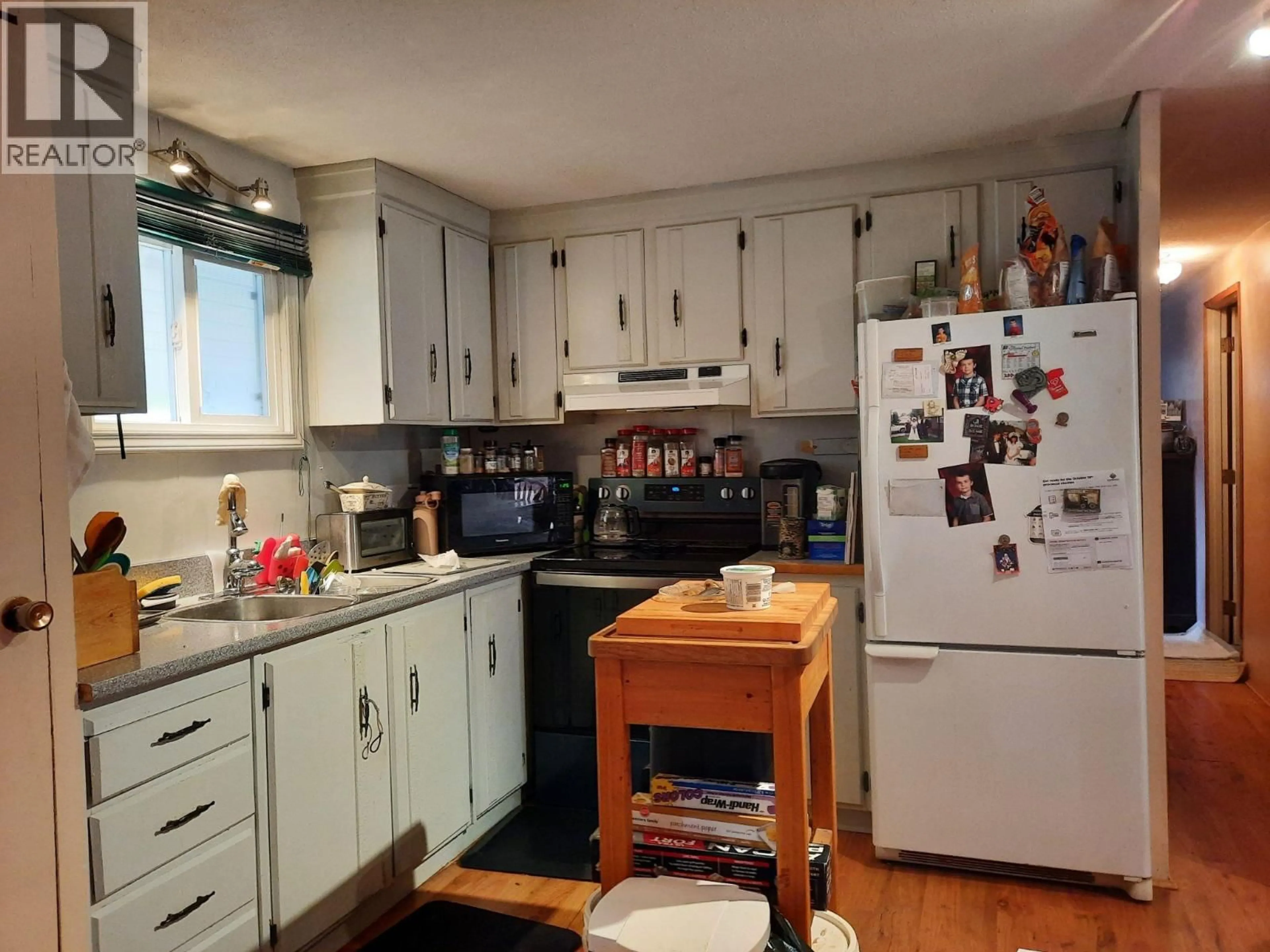 Standard kitchen, wood/laminate floor for 4300 VICTORIA AVENUE EAST, Grand Forks British Columbia V0H1H5