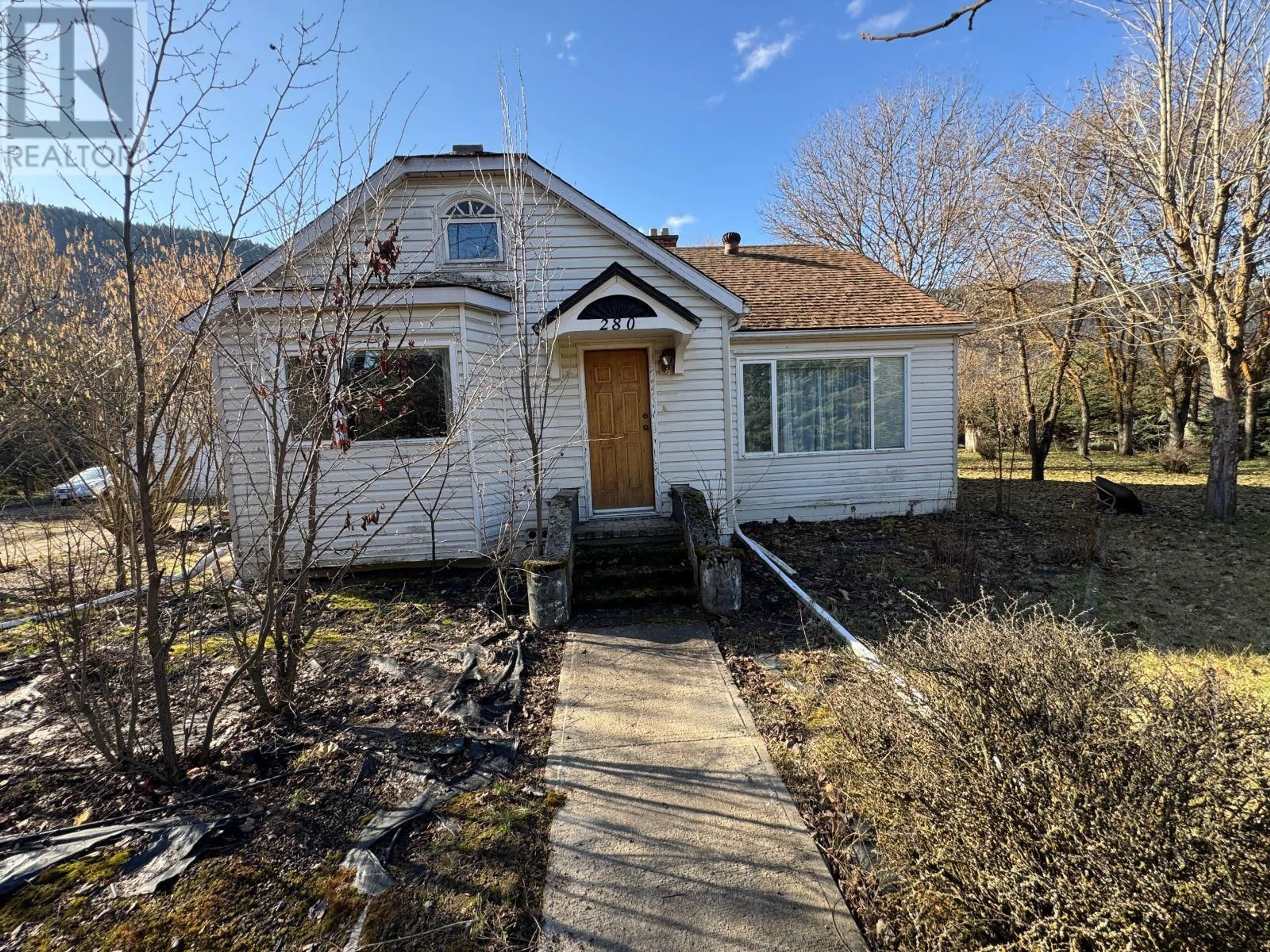 A pic from outside/outdoor area/front of a property/back of a property/a pic from drone, street for 280 CARSON ROAD, Grand Forks British Columbia V0H1H4