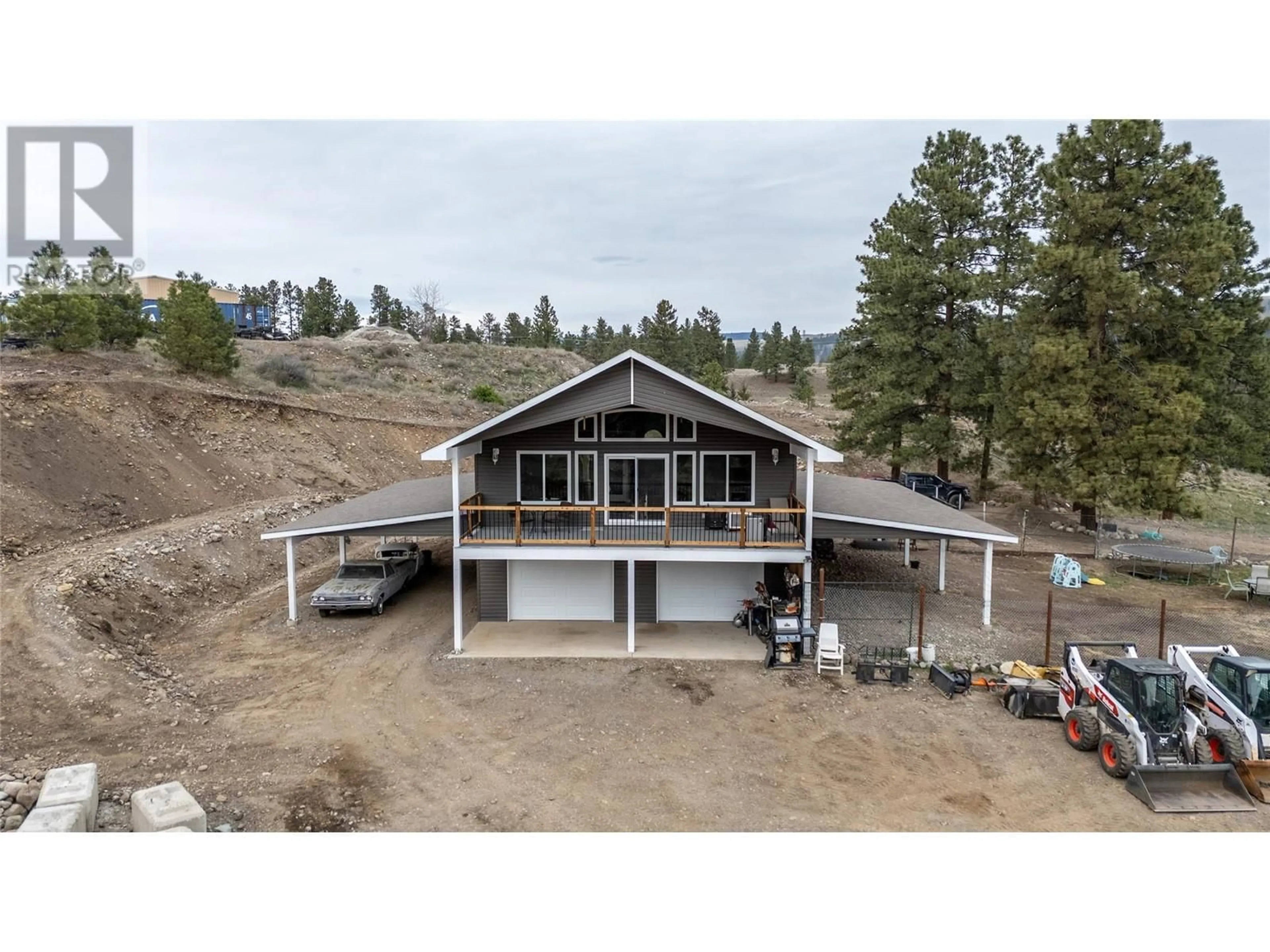 A pic from outside/outdoor area/front of a property/back of a property/a pic from drone, building for 302 LAURIE CURRIE WAY, Princeton British Columbia V0X1W0