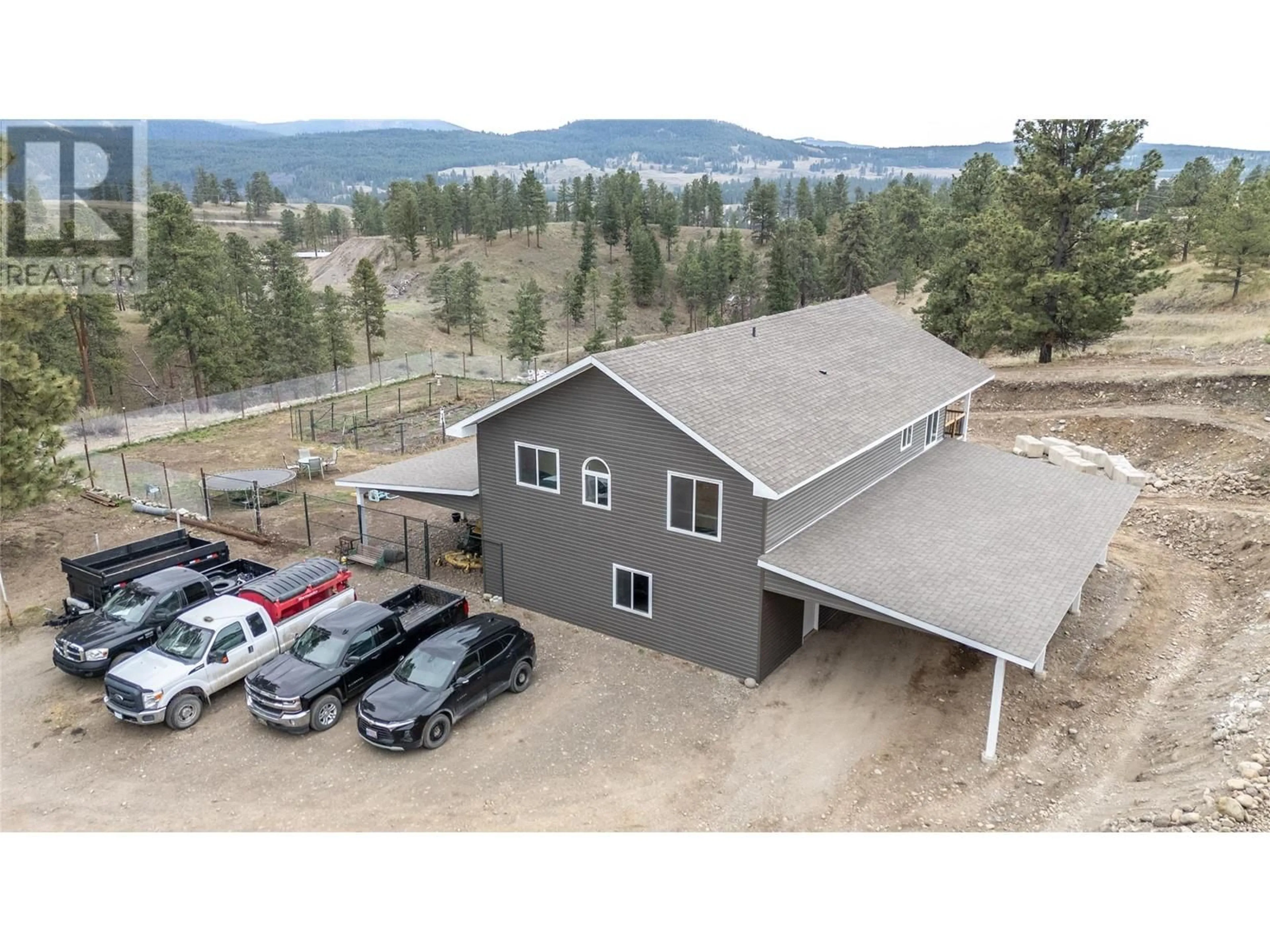 A pic from outside/outdoor area/front of a property/back of a property/a pic from drone, mountain view for 302 LAURIE CURRIE WAY, Princeton British Columbia V0X1W0
