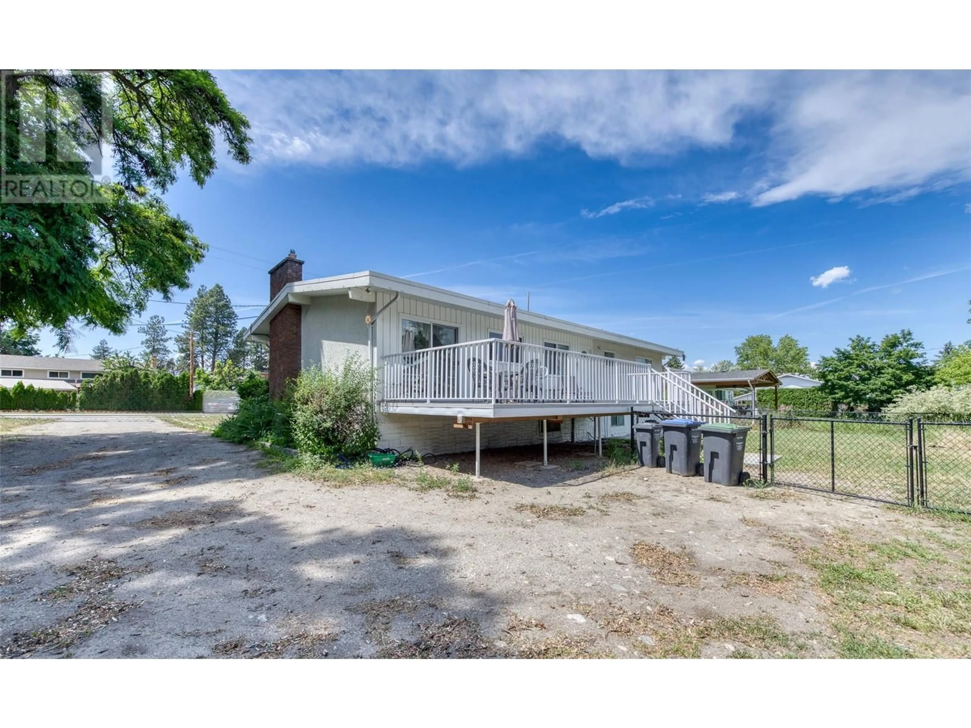 A pic from outside/outdoor area/front of a property/back of a property/a pic from drone, unknown for 4383 GORDON DRIVE, Kelowna British Columbia V1W1S7