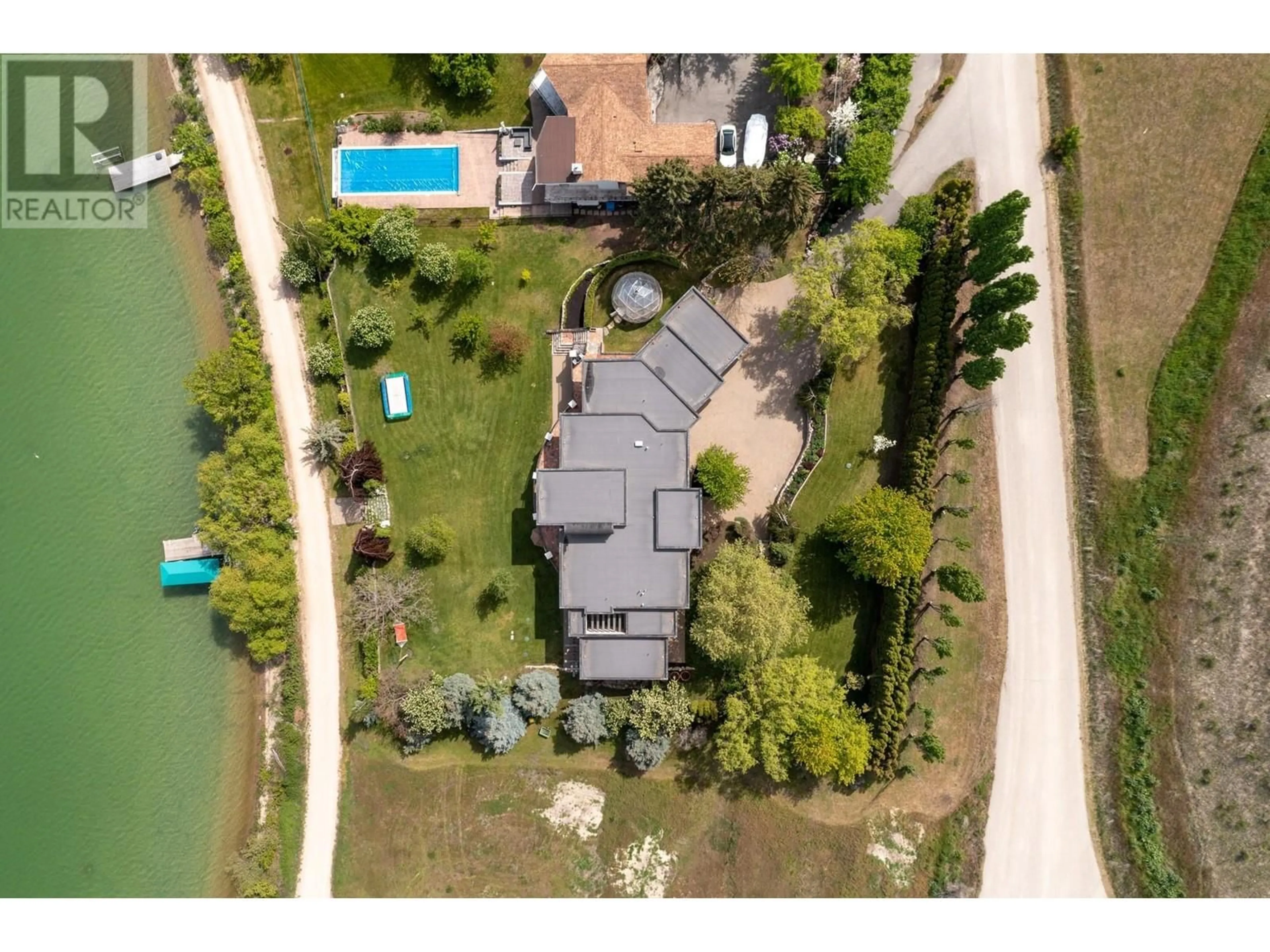 A pic from outside/outdoor area/front of a property/back of a property/a pic from drone, water/lake/river/ocean view for 16191 BUTTERWORTH ROAD, Lake Country British Columbia V4V2E8