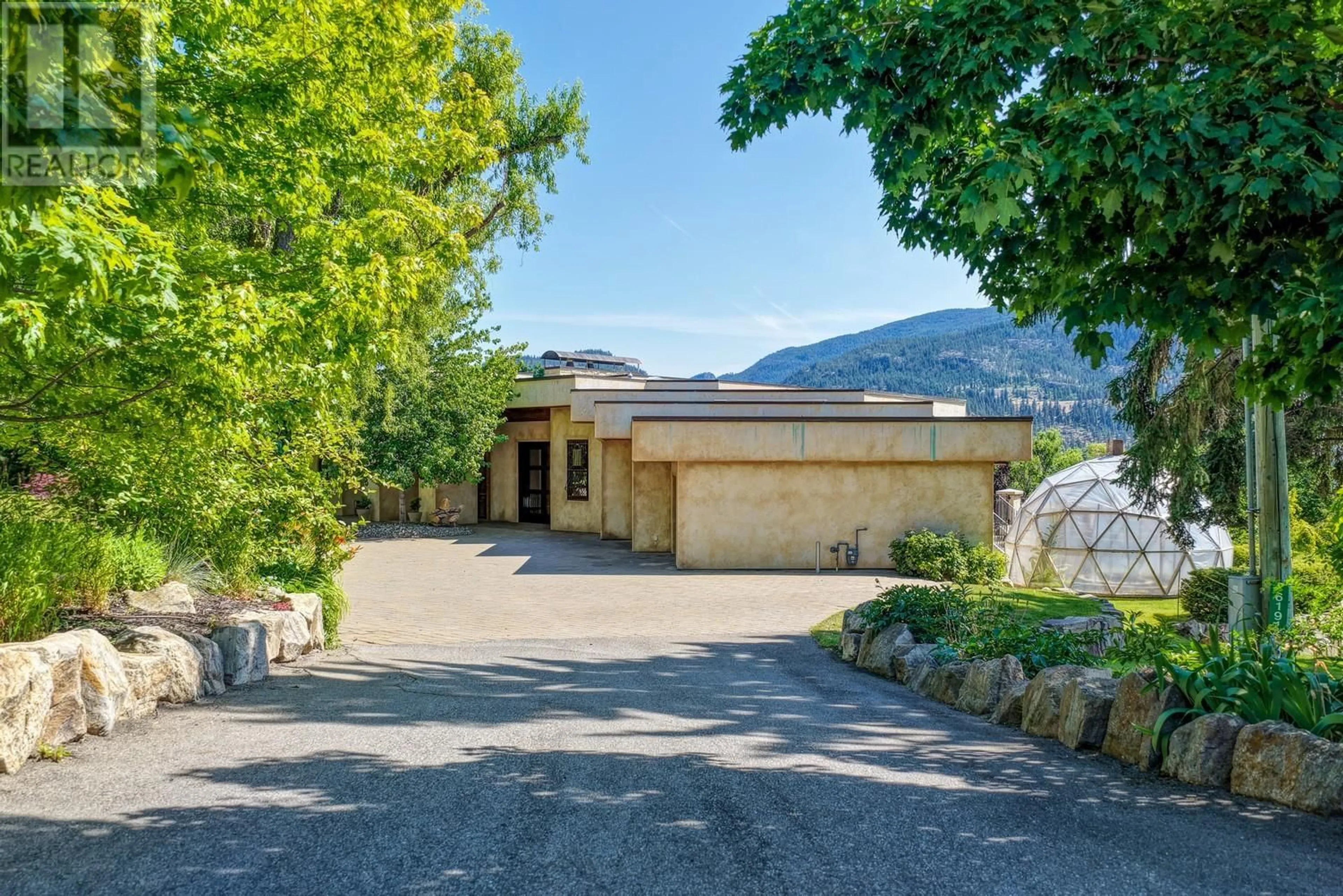 A pic from outside/outdoor area/front of a property/back of a property/a pic from drone, mountain view for 16191 BUTTERWORTH ROAD, Lake Country British Columbia V4V2E8