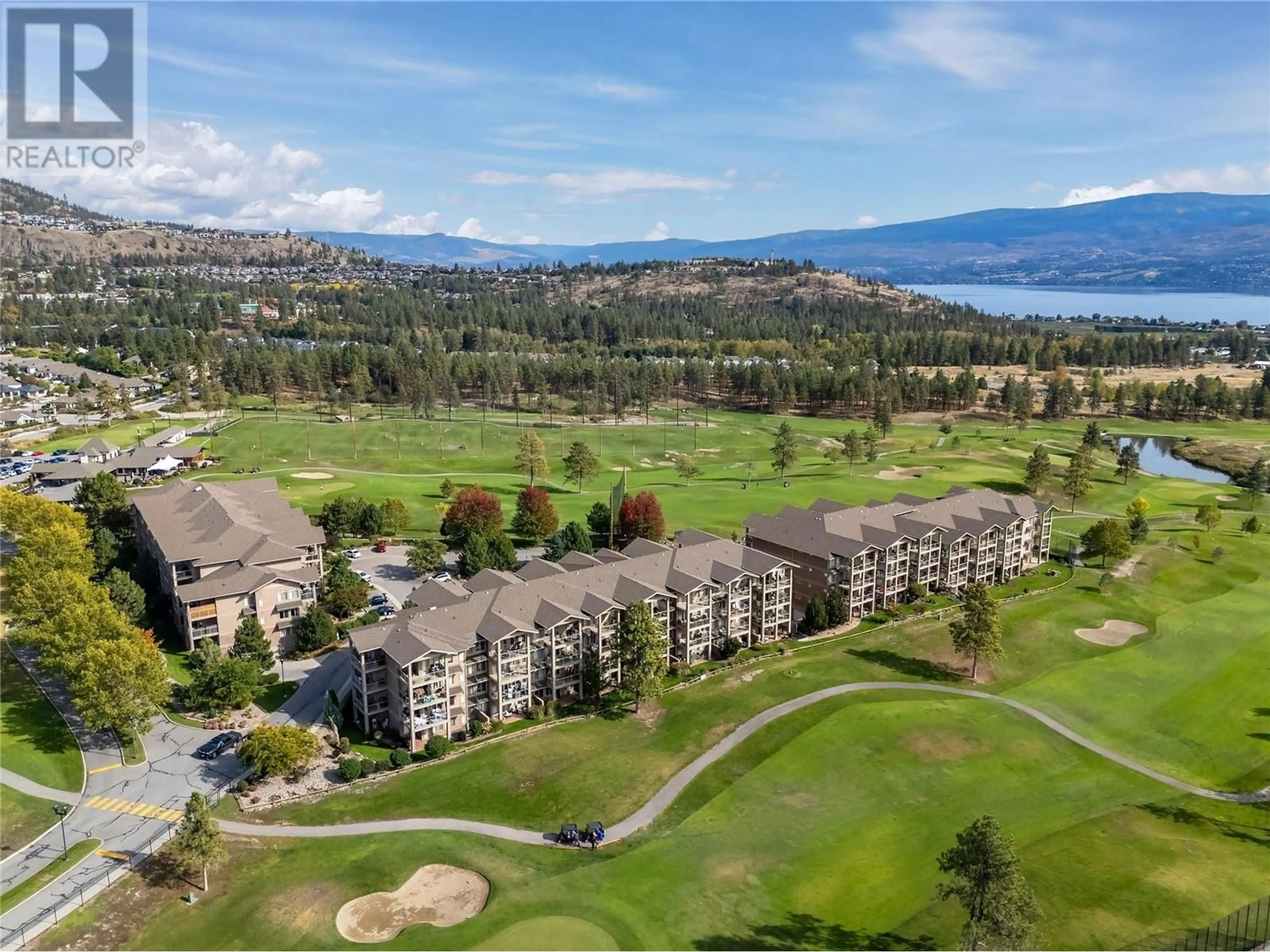 A pic from outside/outdoor area/front of a property/back of a property/a pic from drone, mountain view for 112 - 3521 CARRINGTON ROAD, West Kelowna British Columbia V4T2E6