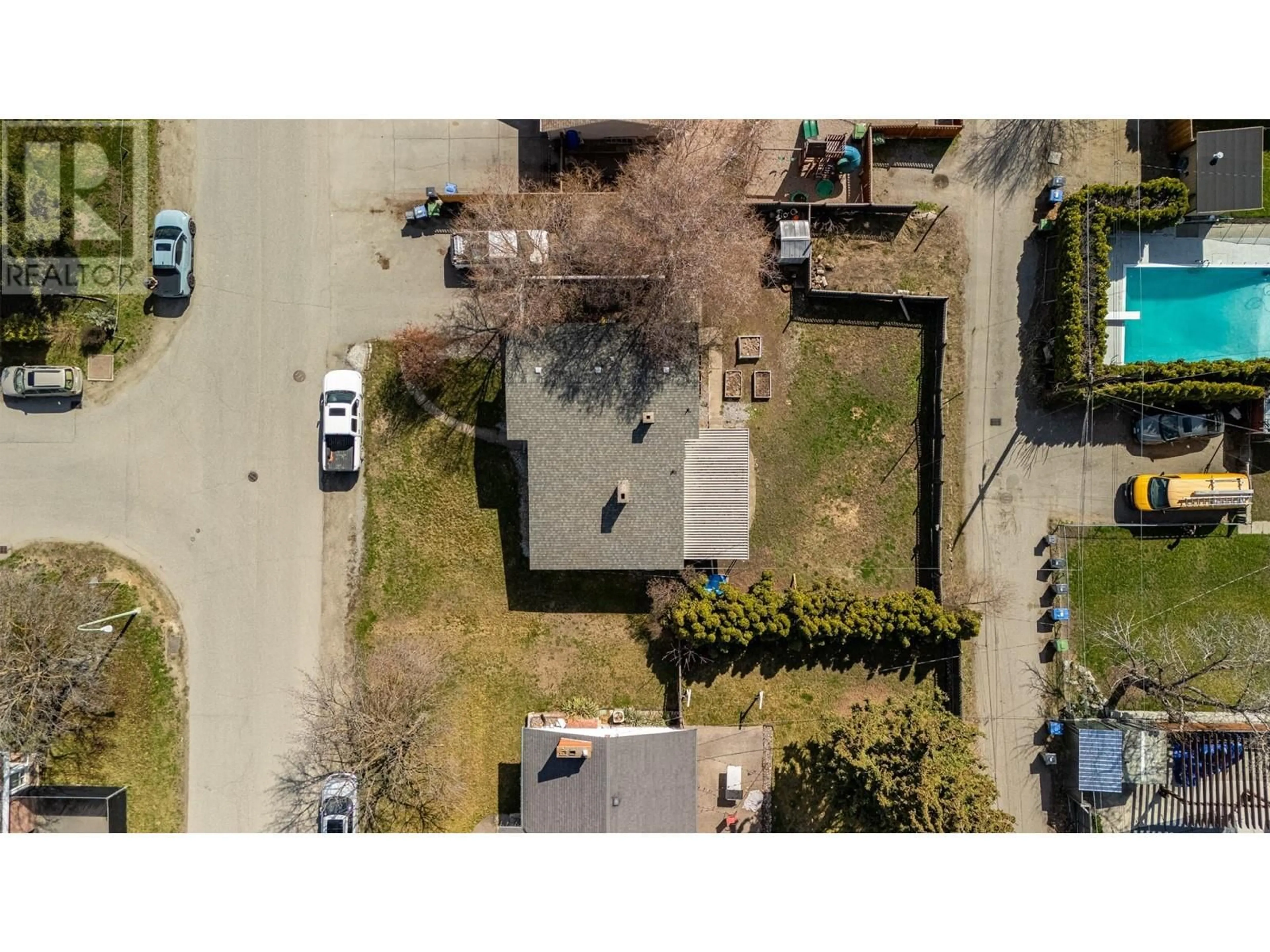 A pic from outside/outdoor area/front of a property/back of a property/a pic from drone, street for 1388 CHERRY CRESCENT WEST, Kelowna British Columbia V1Y3X8