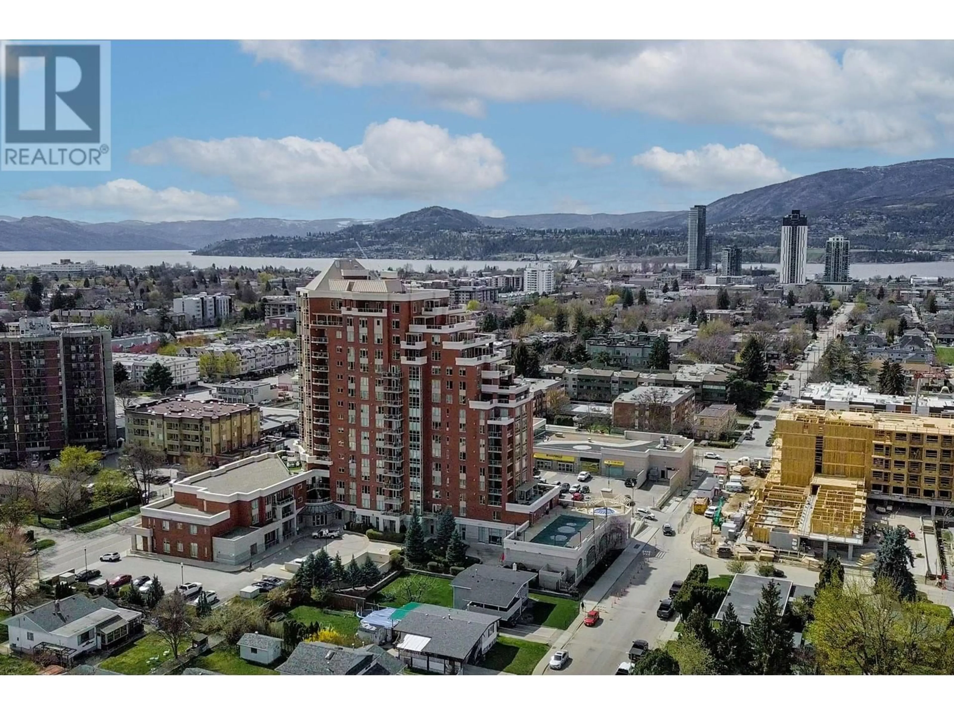 A pic from outside/outdoor area/front of a property/back of a property/a pic from drone, mountain view for 205 - 1160 BERNARD AVENUE, Kelowna British Columbia V1Y6R2
