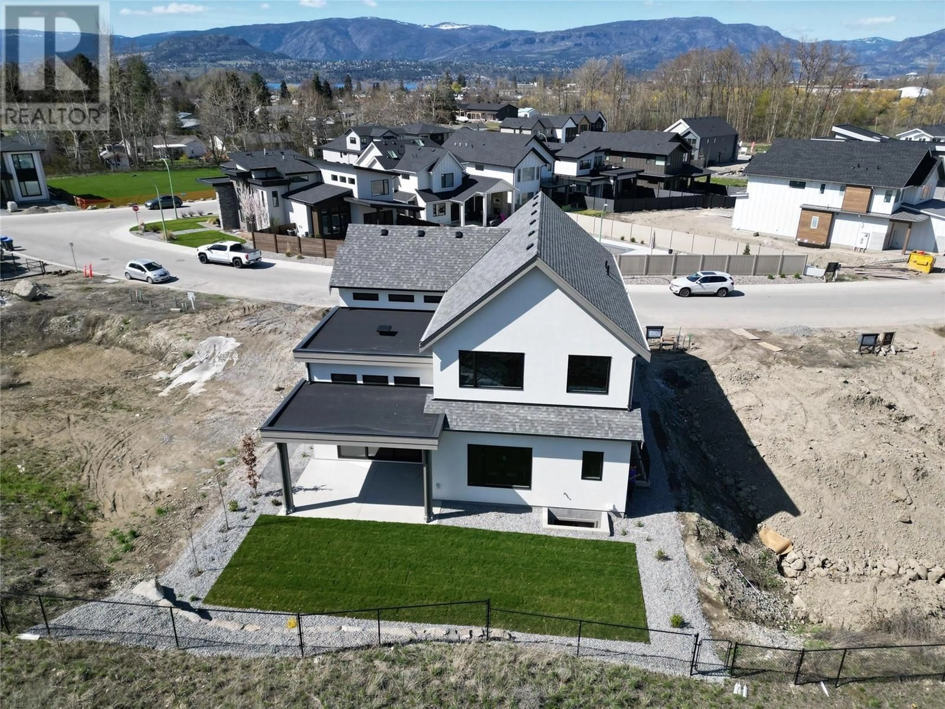 A pic from outside/outdoor area/front of a property/back of a property/a pic from drone, building for 1028 BULL CRESCENT, Kelowna British Columbia V1W4N2