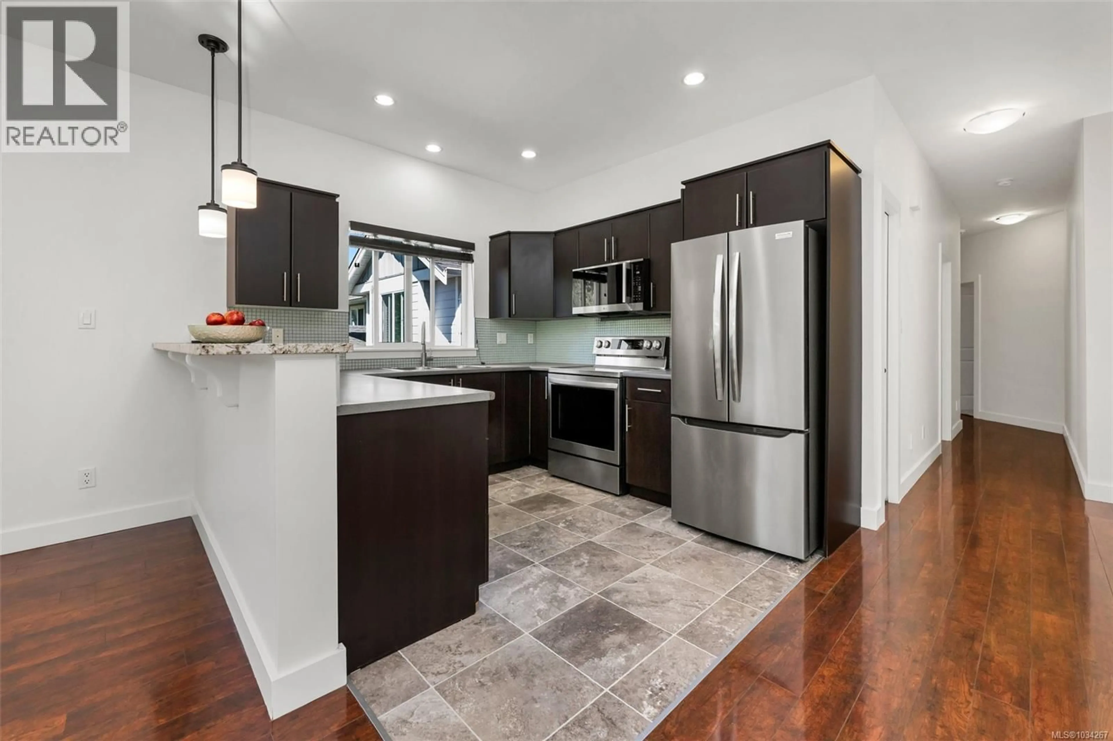 Open concept kitchen, ceramic/tile floor for 1191 PARKDALE CREEK GARDENS, Langford British Columbia V9B4G9