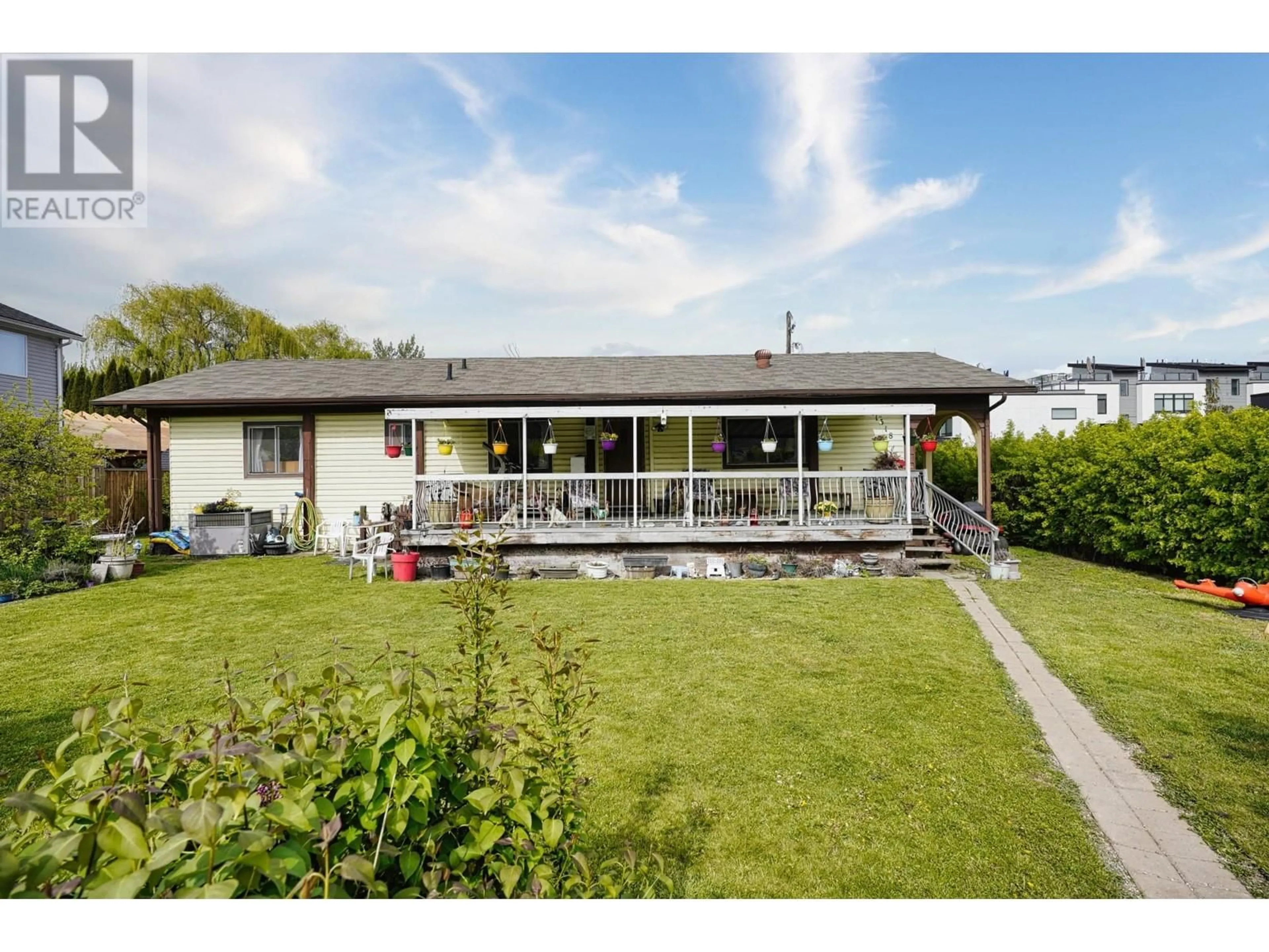 A pic from outside/outdoor area/front of a property/back of a property/a pic from drone, street for 1 - 11518 ROGERS ROAD, Lake Country British Columbia V4V1X8