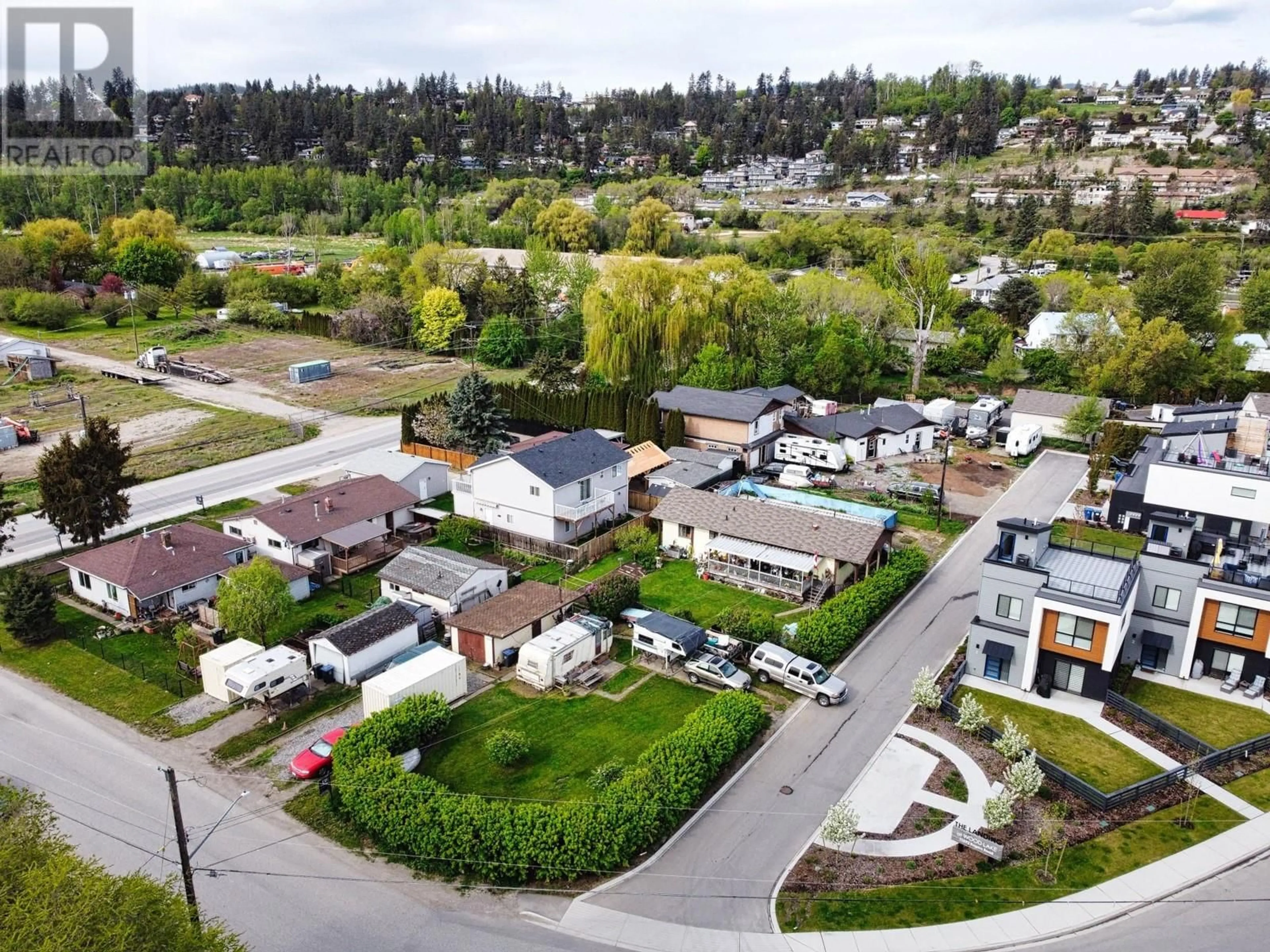 A pic from outside/outdoor area/front of a property/back of a property/a pic from drone, street for 1 - 11518 ROGERS ROAD, Lake Country British Columbia V4V1X8