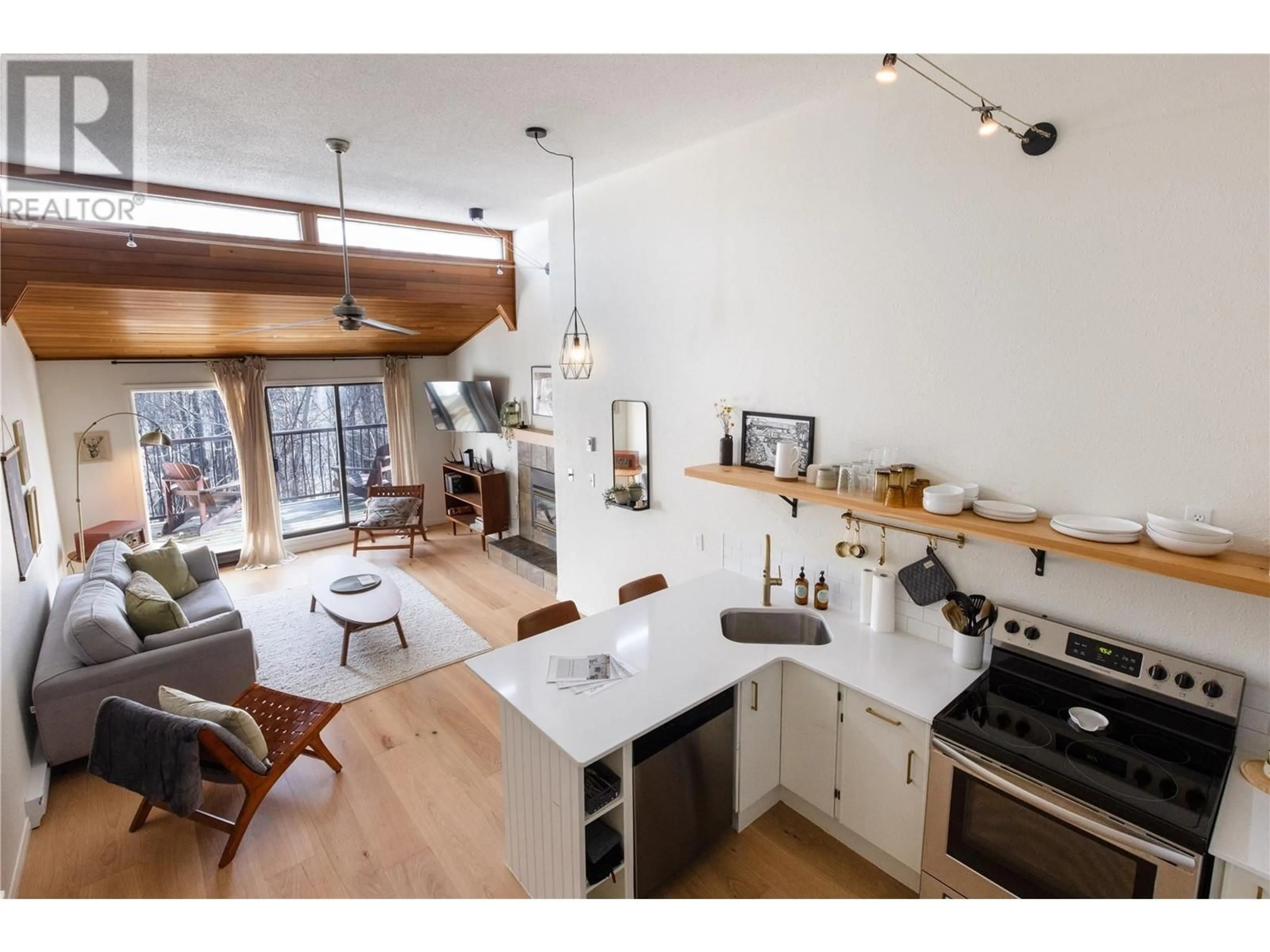 Open concept kitchen, wood/laminate floor for 1005 - 930 DOGWOOD DRIVE, Kimberley British Columbia V1A3E9