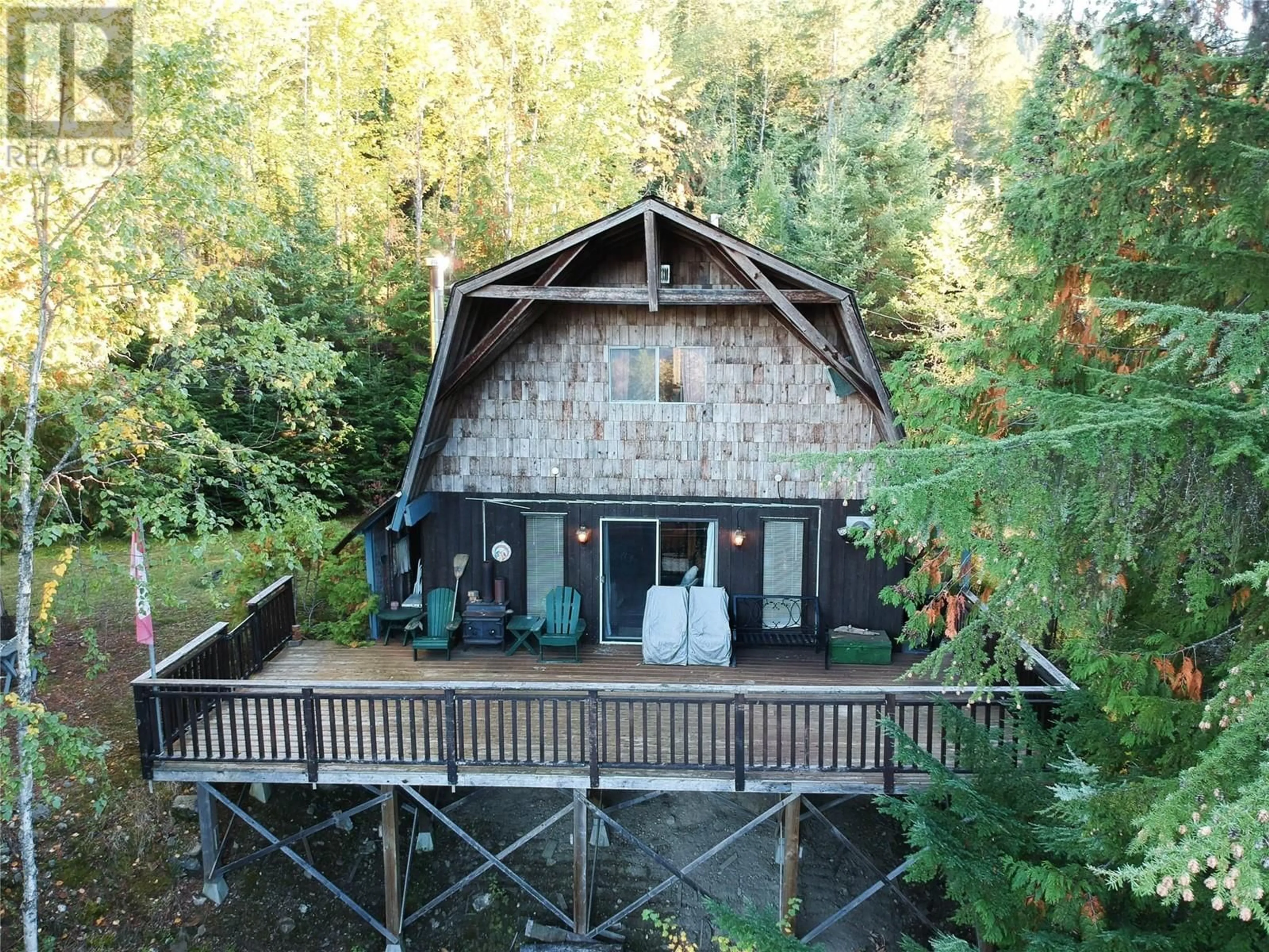 A pic from outside/outdoor area/front of a property/back of a property/a pic from drone, water/lake/river/ocean view for 3217 LUMBY MABEL LAKE ROAD, Lumby British Columbia V0E2G6