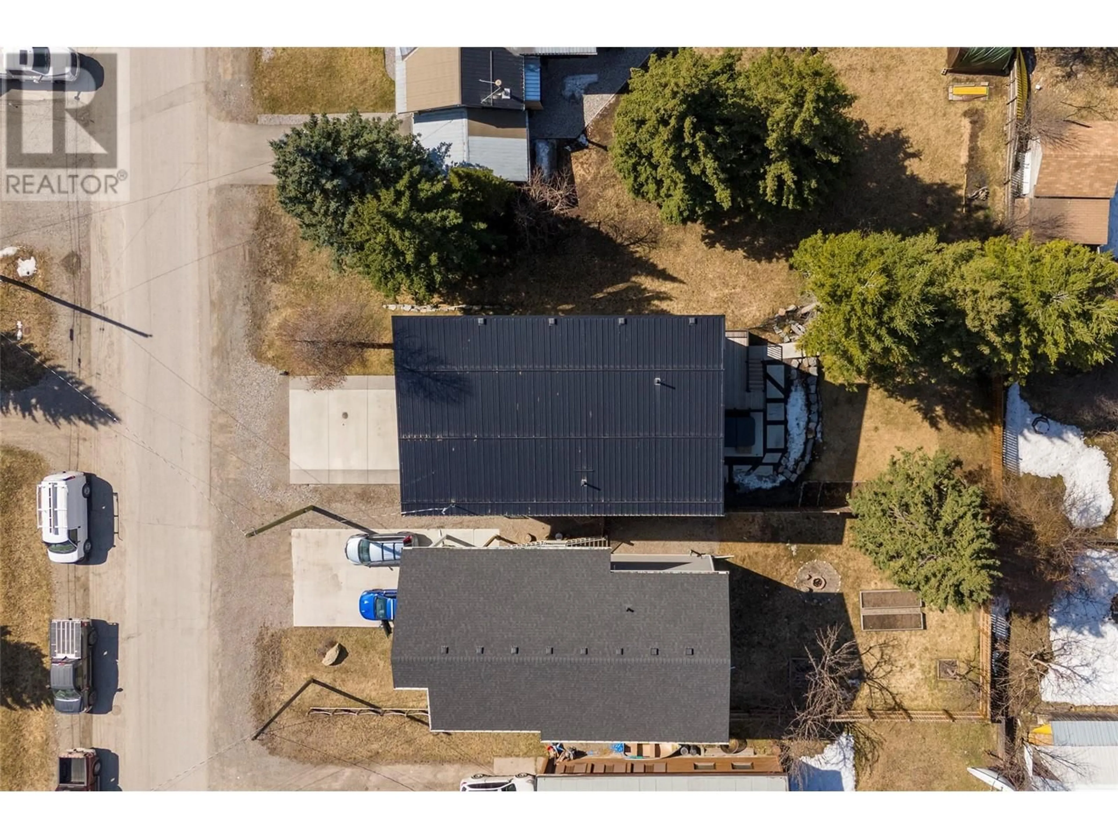 A pic from outside/outdoor area/front of a property/back of a property/a pic from drone, street for 1129 MCLEOD AVENUE, Fernie British Columbia V0B1M1