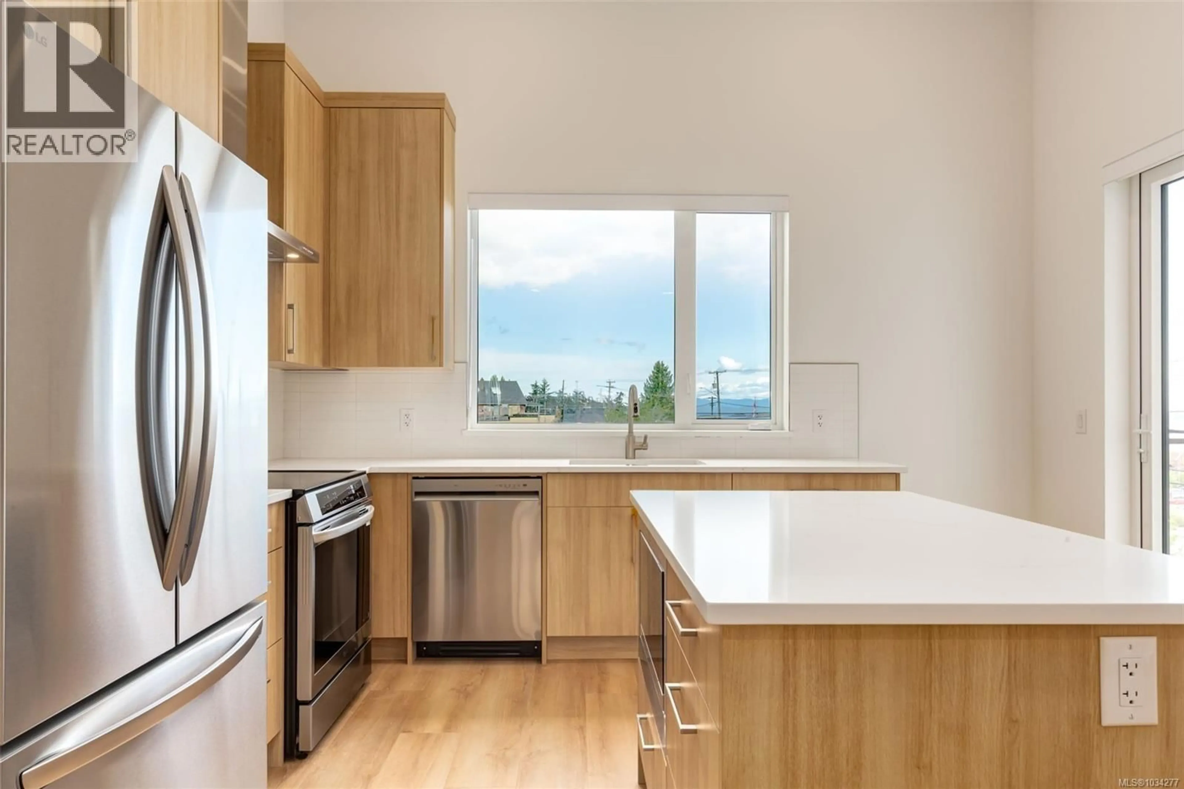 Standard kitchen, wood/laminate floor for 204 - 7181 LANTZVILLE ROAD, Lantzville British Columbia V0R2H0
