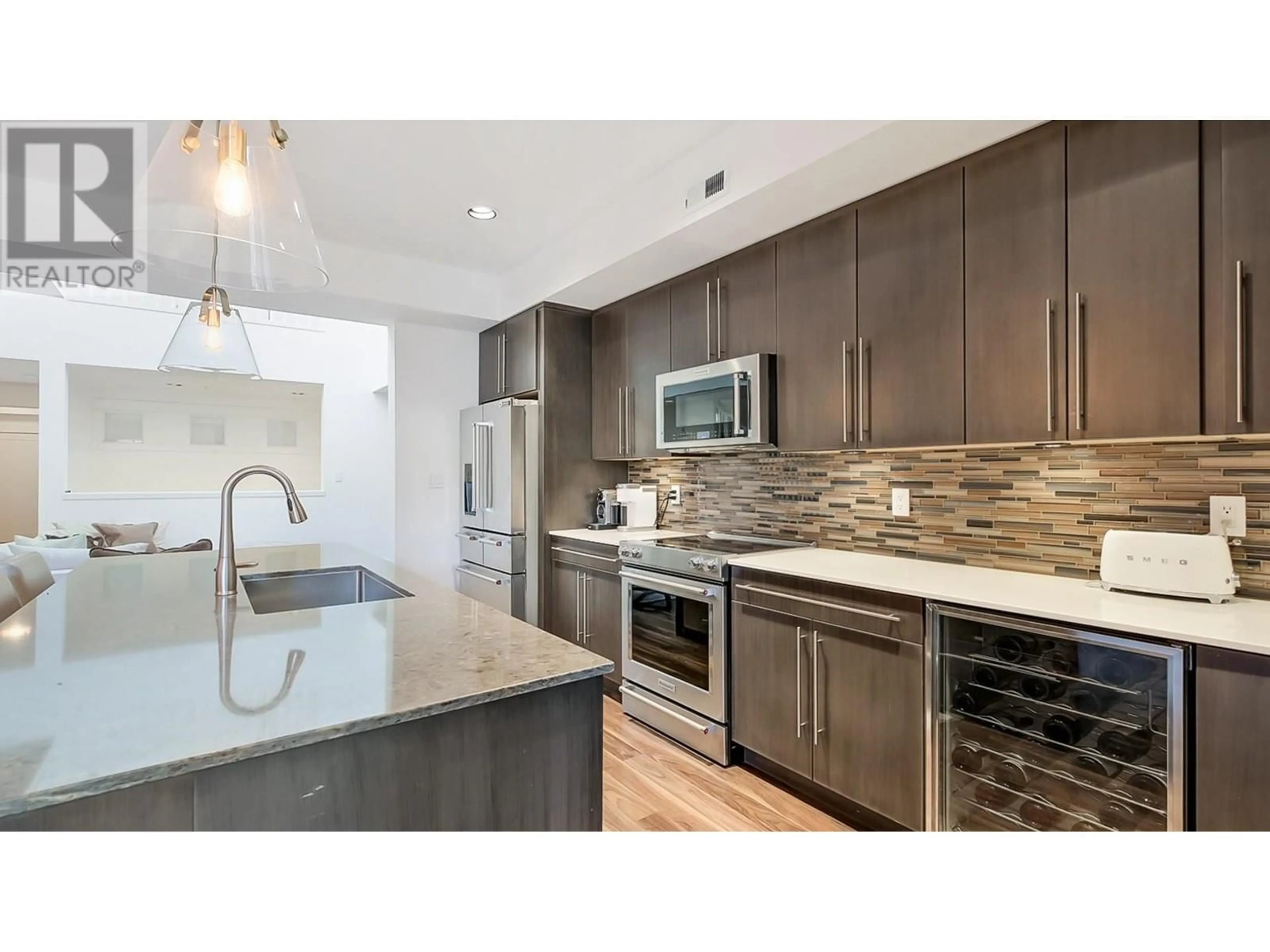 Open concept kitchen, ceramic/tile floor for 125 - 3880 TRUSWELL ROAD, Kelowna British Columbia V1W5A2