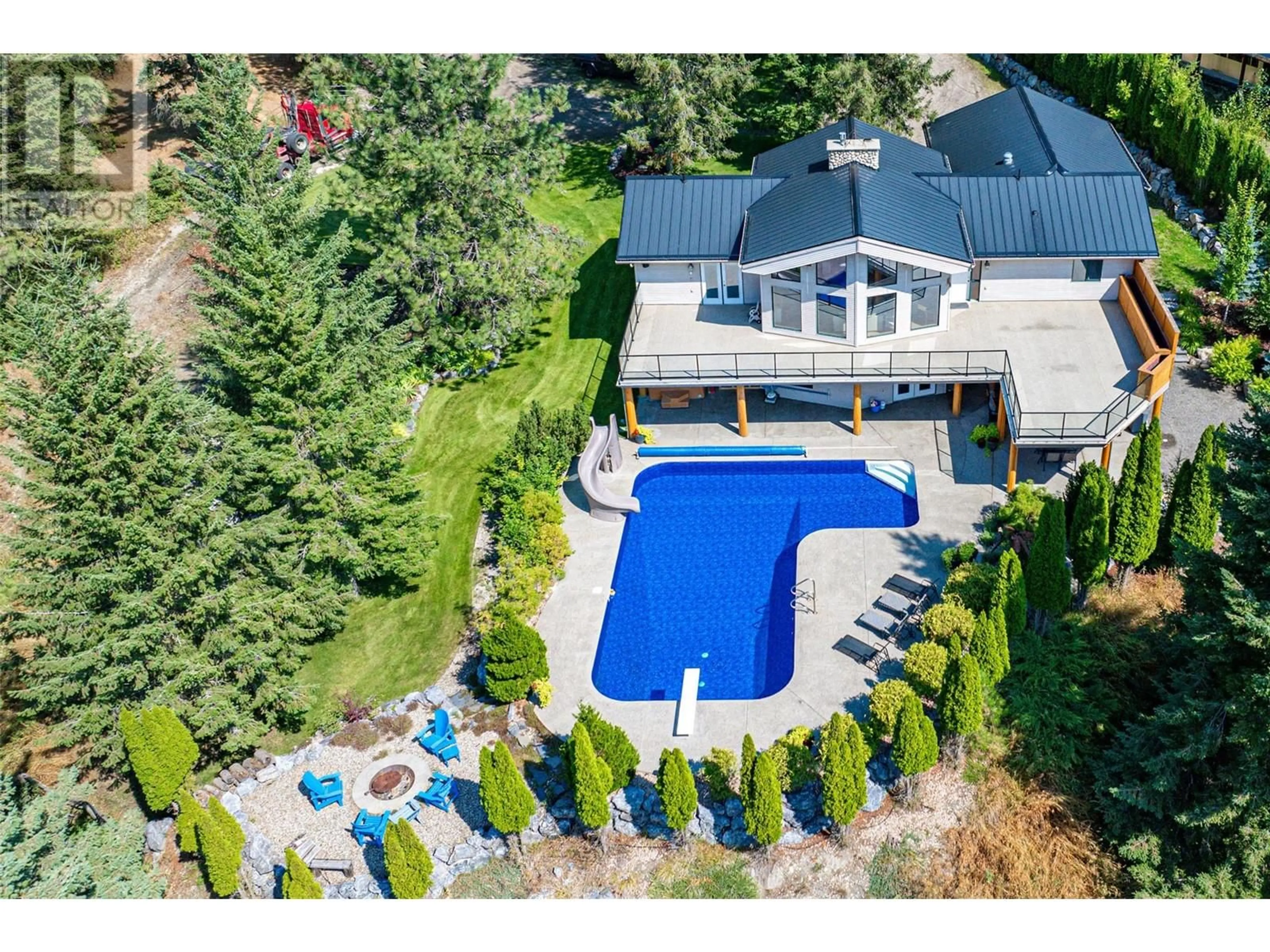 A pic from outside/outdoor area/front of a property/back of a property/a pic from drone, water/lake/river/ocean view for 10 CANDIDE DRIVE, Lumby British Columbia V0E2G1