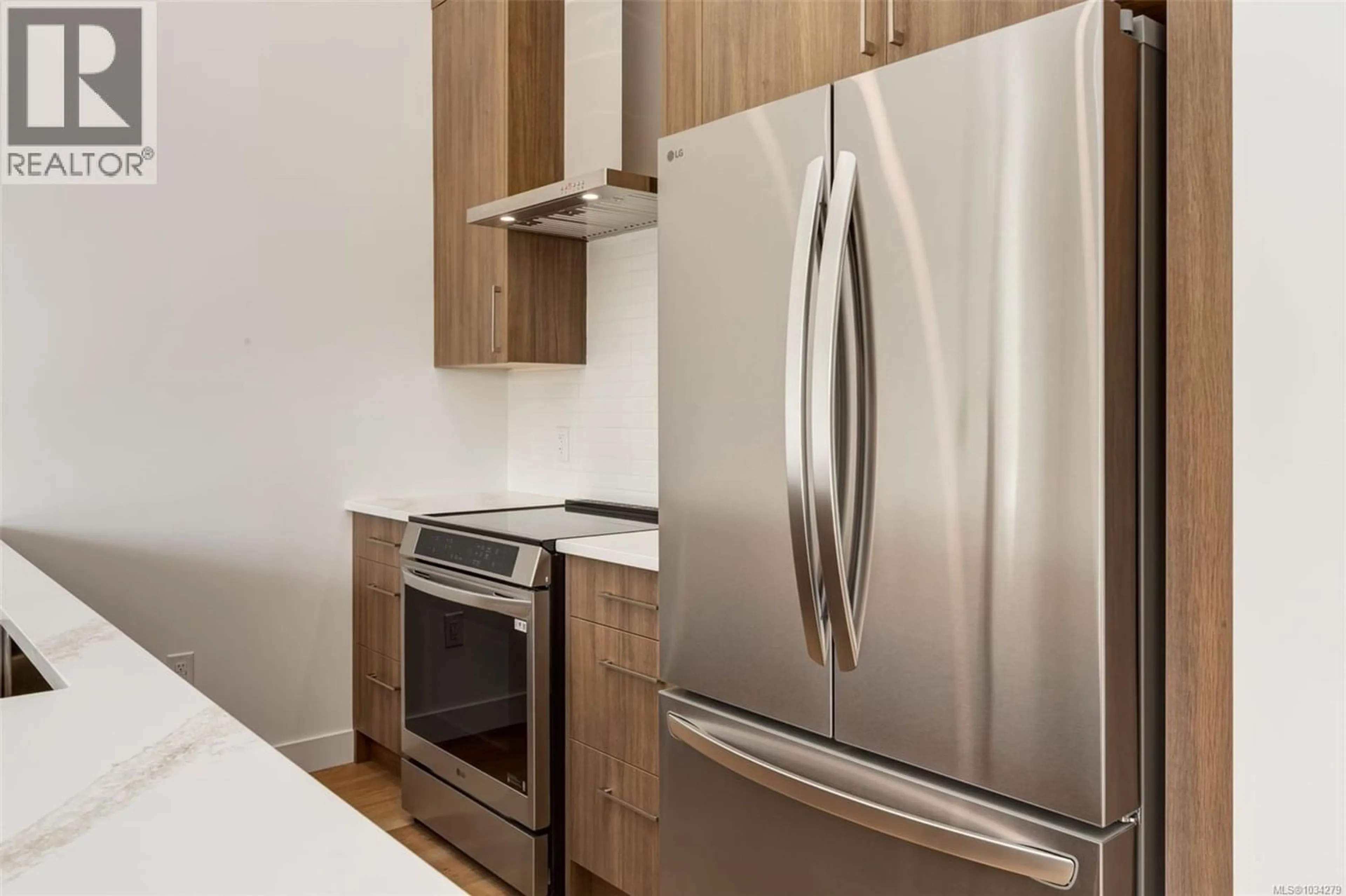Standard kitchen, wood/laminate floor for 303 - 7181 LANTZVILLE ROAD, Lantzville British Columbia V0R2H0