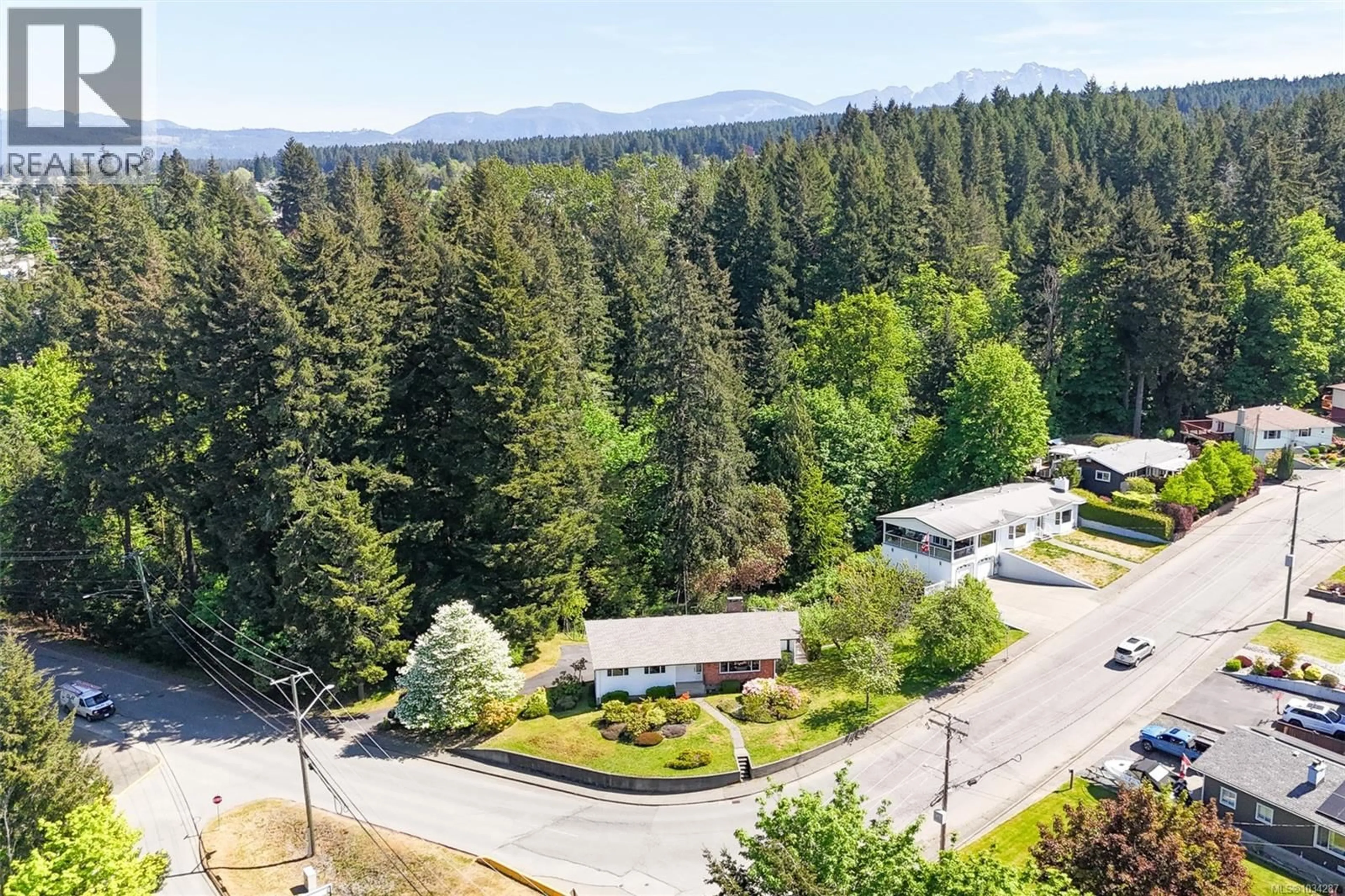 A pic from outside/outdoor area/front of a property/back of a property/a pic from drone, forest/trees view for 2293 CAMERON DRIVE, Port Alberni British Columbia V9Y1A8