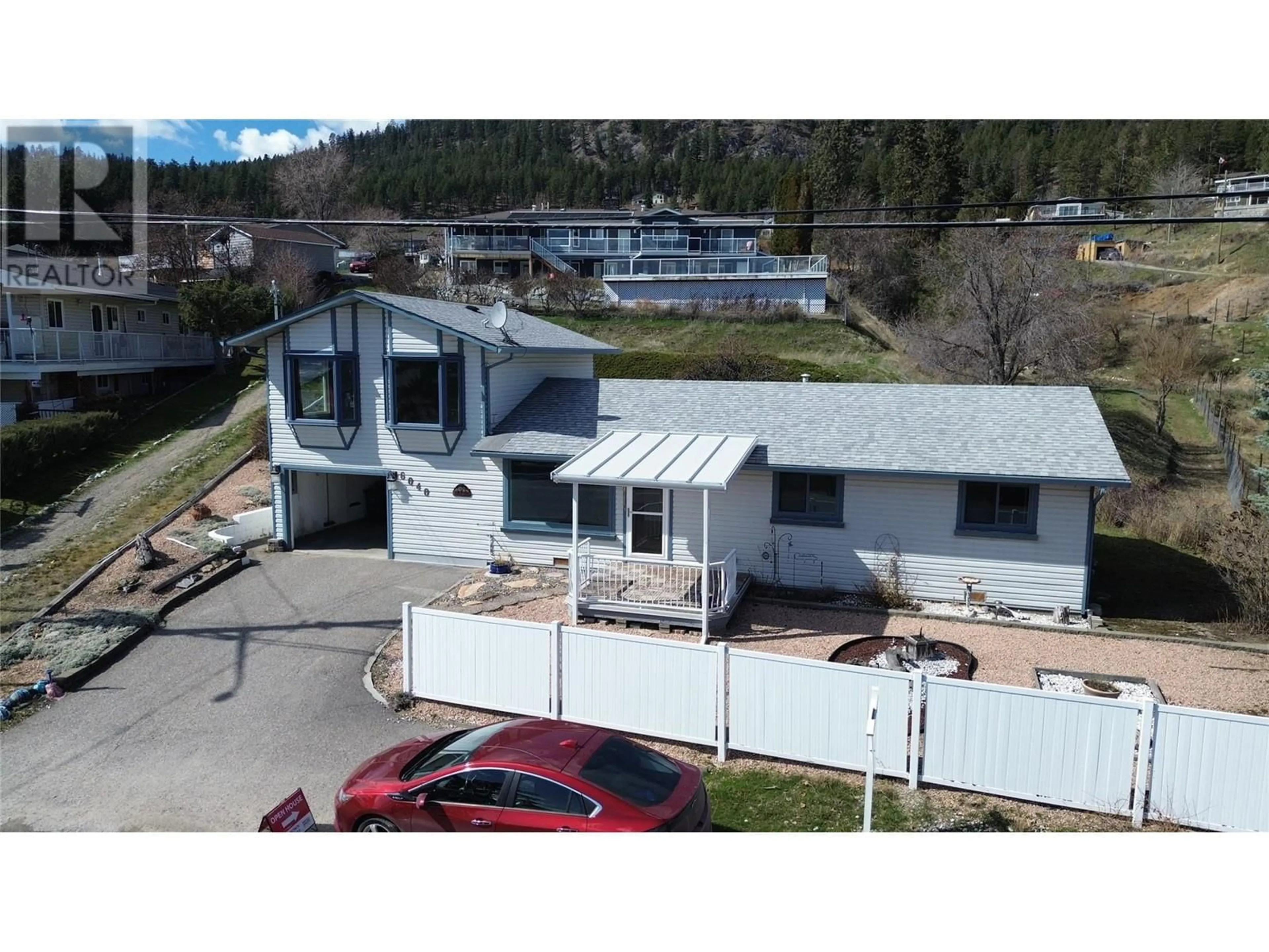 A pic from outside/outdoor area/front of a property/back of a property/a pic from drone, unknown for 6040 ELLISON AVENUE, Peachland British Columbia V0H1X4