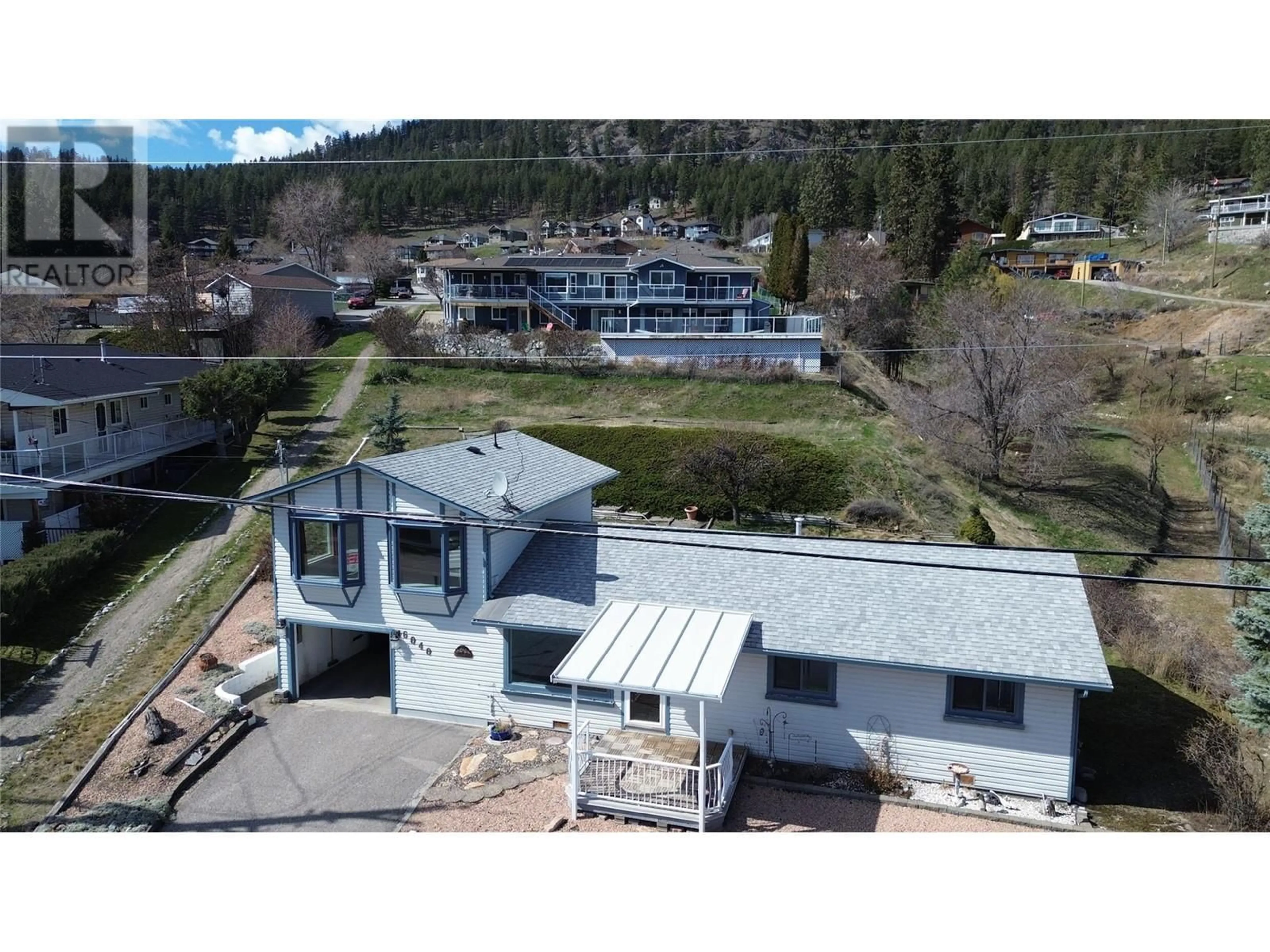 A pic from outside/outdoor area/front of a property/back of a property/a pic from drone, mountain view for 6040 ELLISON AVENUE, Peachland British Columbia V0H1X4
