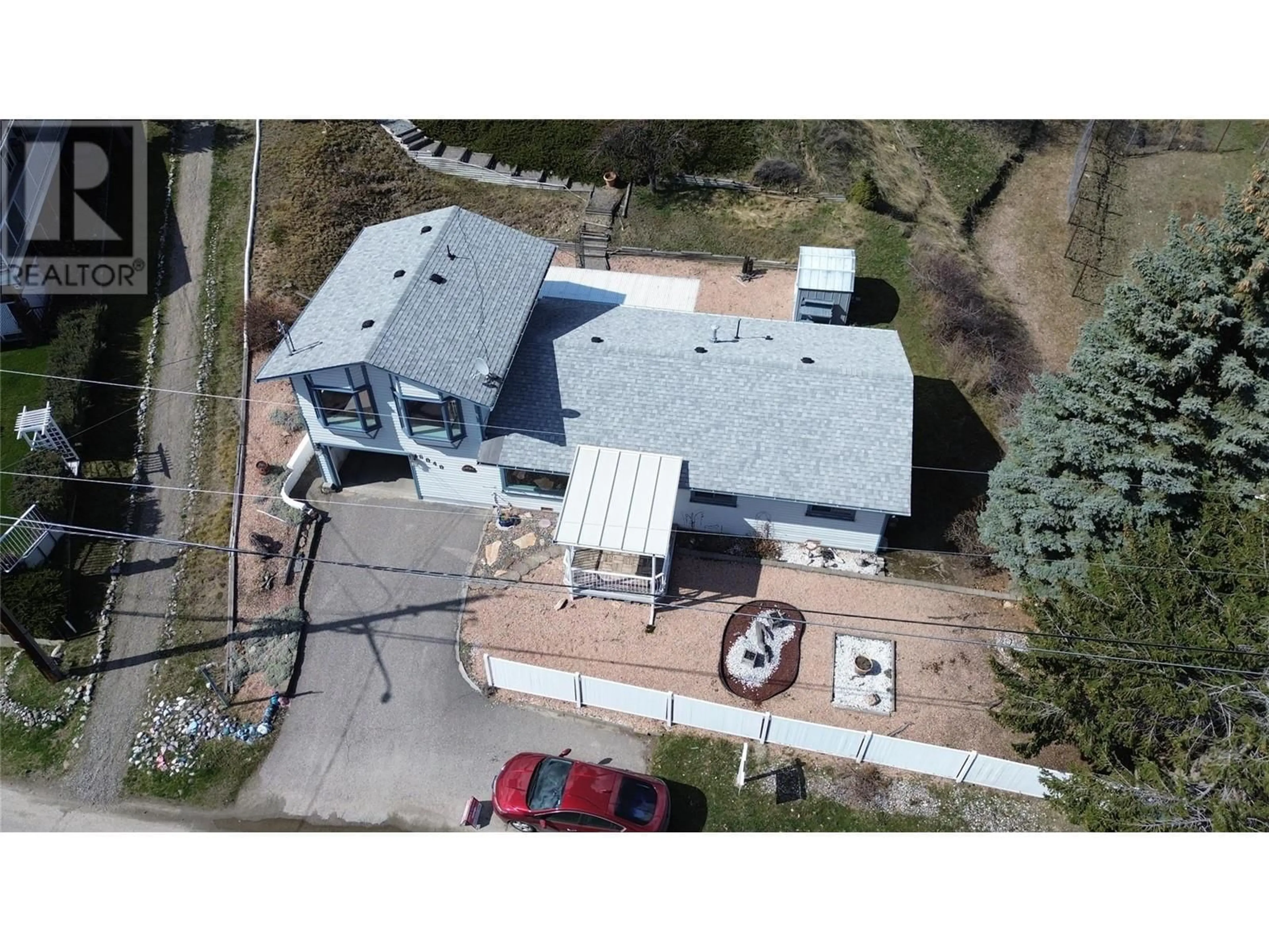 A pic from outside/outdoor area/front of a property/back of a property/a pic from drone, building for 6040 ELLISON AVENUE, Peachland British Columbia V0H1X4