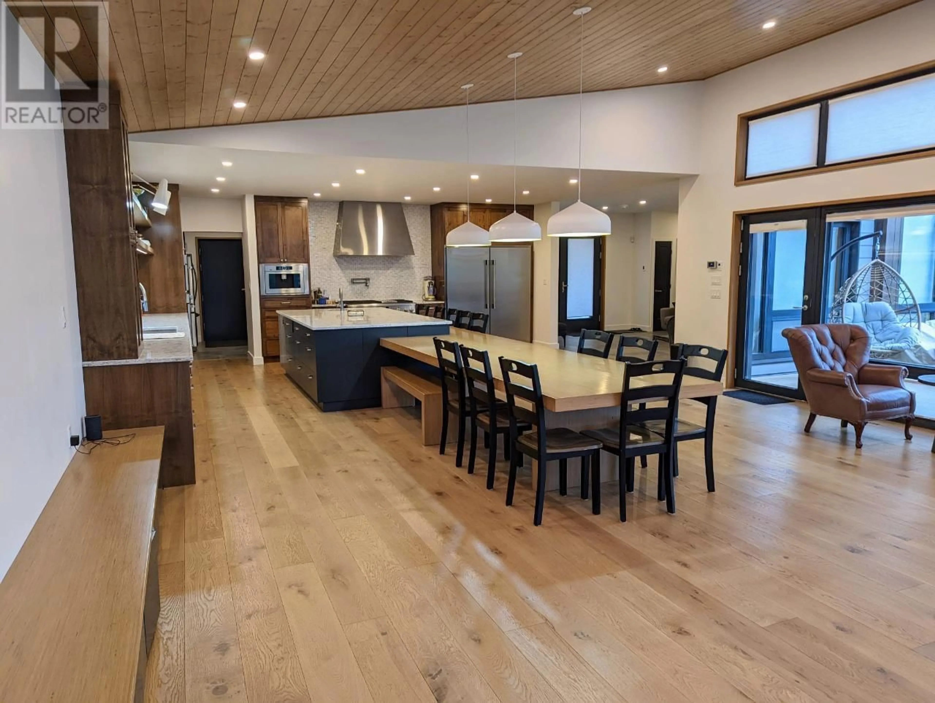 Open concept kitchen, wood/laminate floor for 1731 VICTORIA AVENUE, Windermere British Columbia V0B2L2