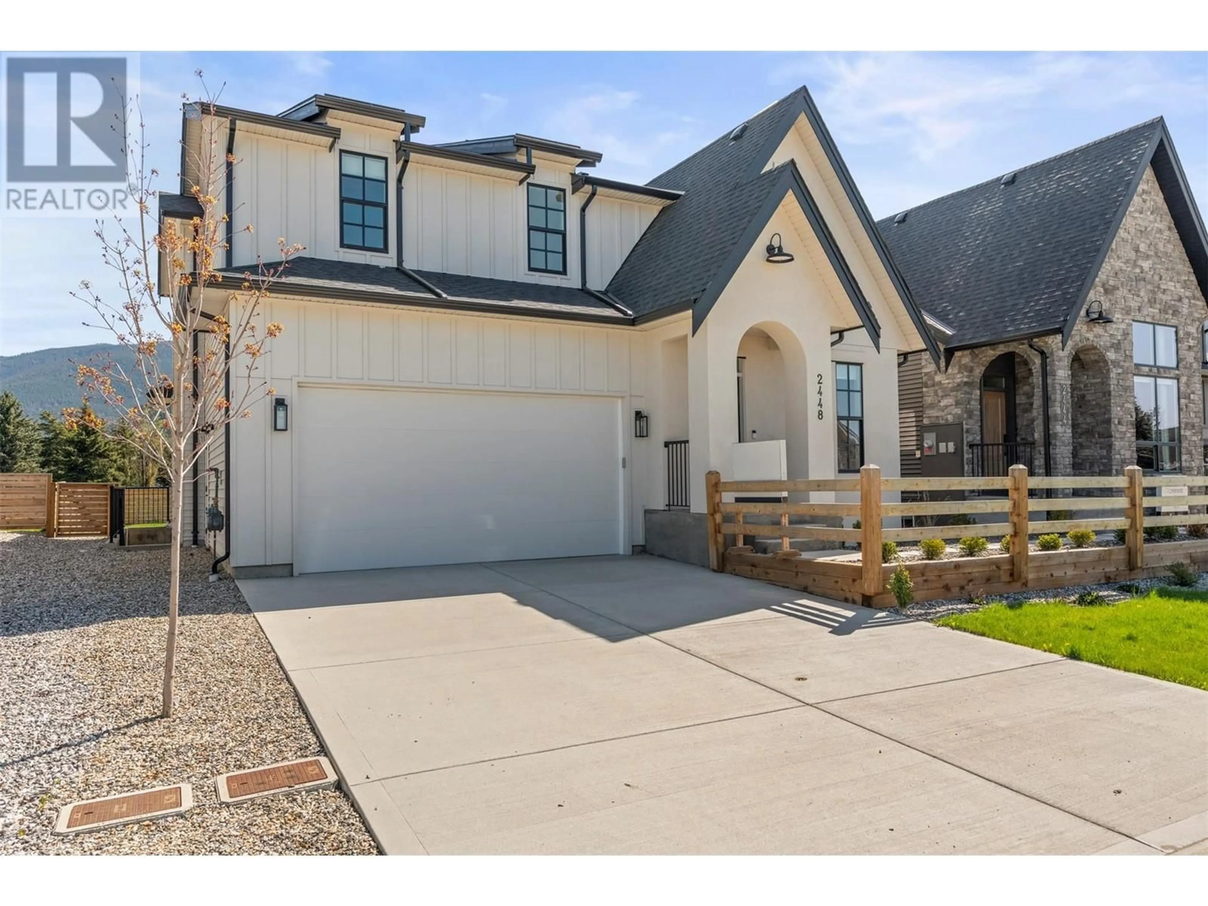 Home with vinyl exterior material, street for 2448 BRADLEY DRIVE, Armstrong British Columbia V4Y0Y4