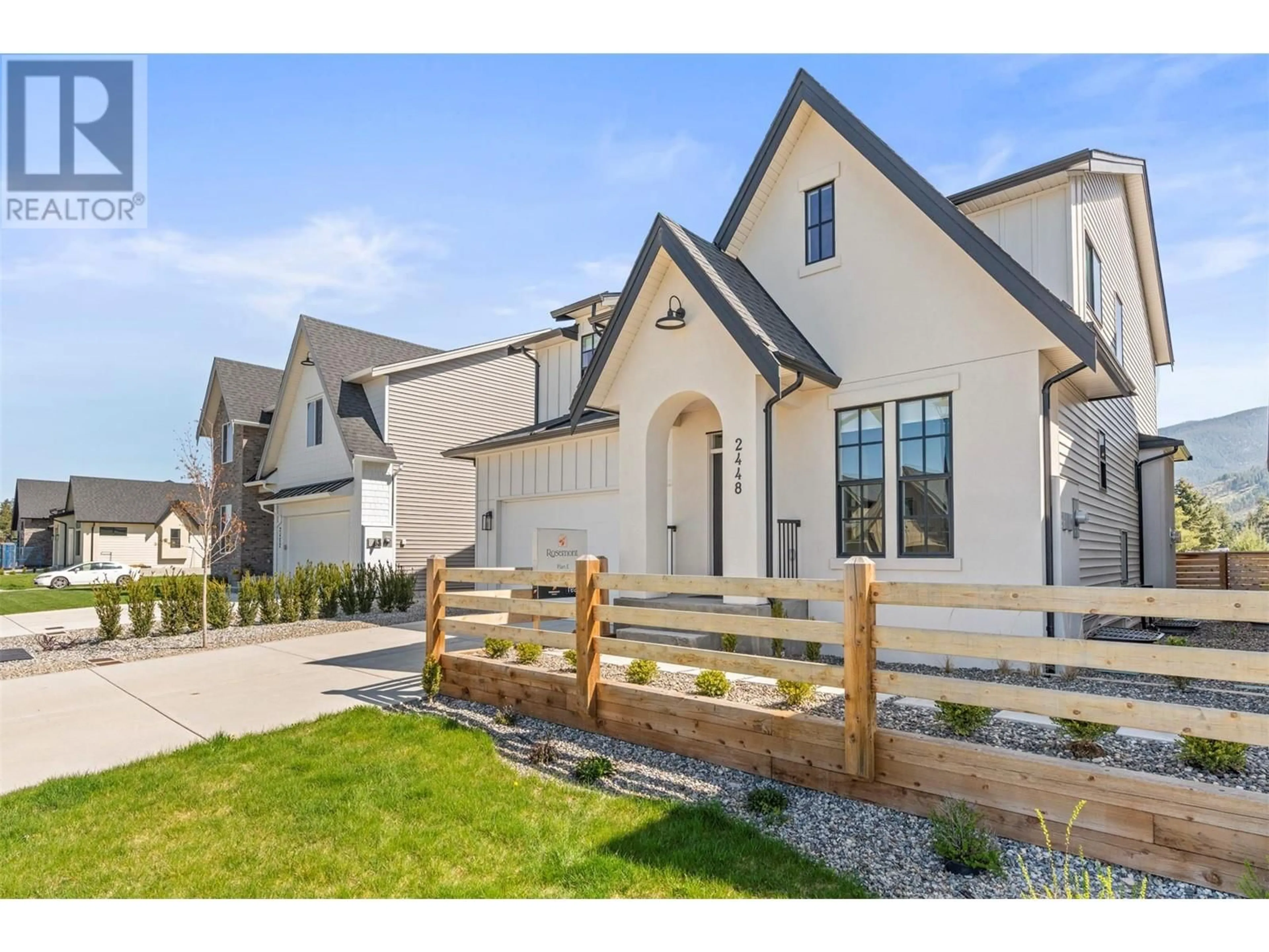 Home with vinyl exterior material, street for 2448 BRADLEY DRIVE, Armstrong British Columbia V4Y0Y4