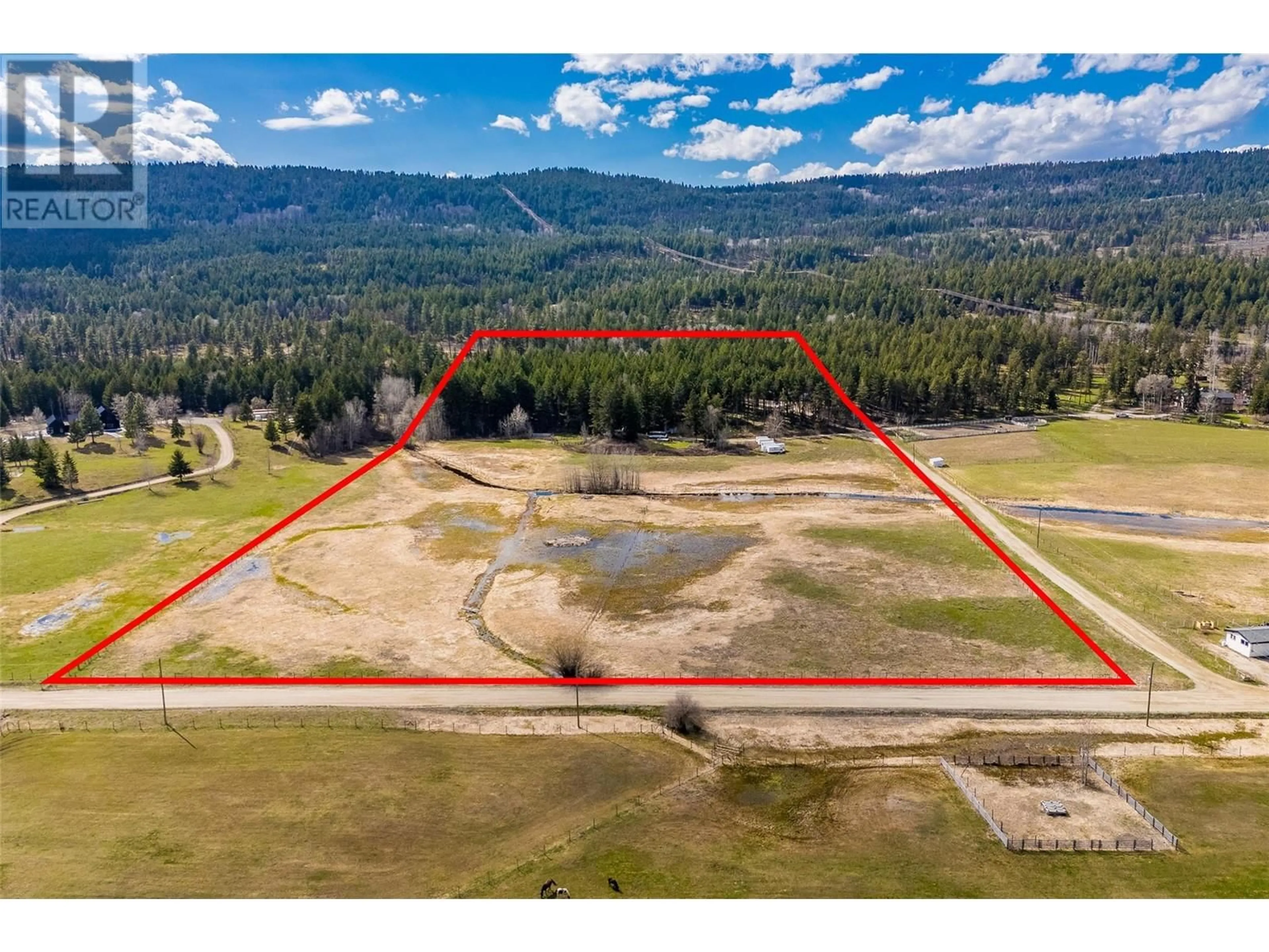 A pic from outside/outdoor area/front of a property/back of a property/a pic from drone, mountain view for 3410 PRESTON ROAD, West Kelowna British Columbia V4T1V9