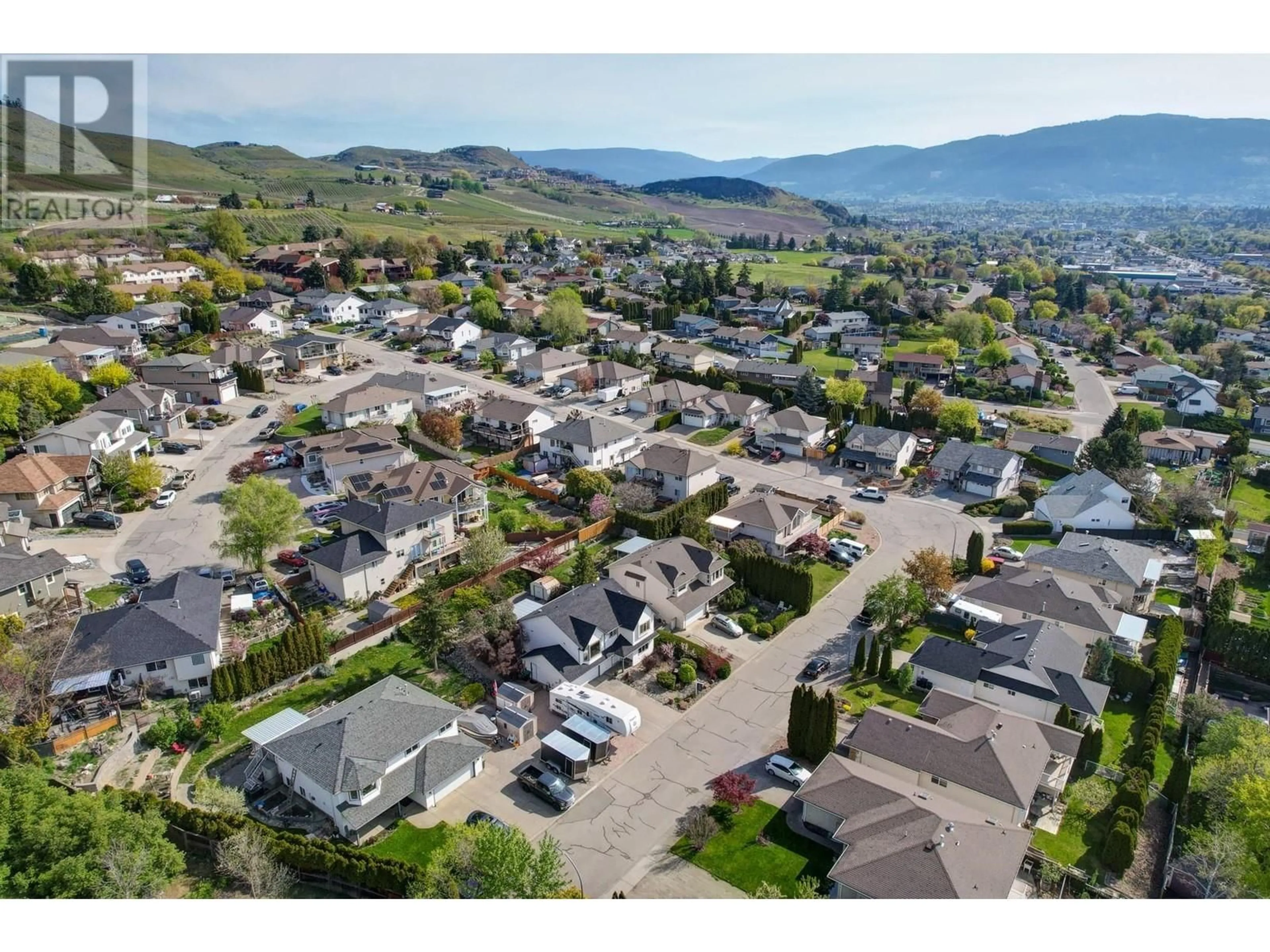 A pic from outside/outdoor area/front of a property/back of a property/a pic from drone, mountain view for 5805 RICHFIELD DRIVE, Vernon British Columbia V1H1A7