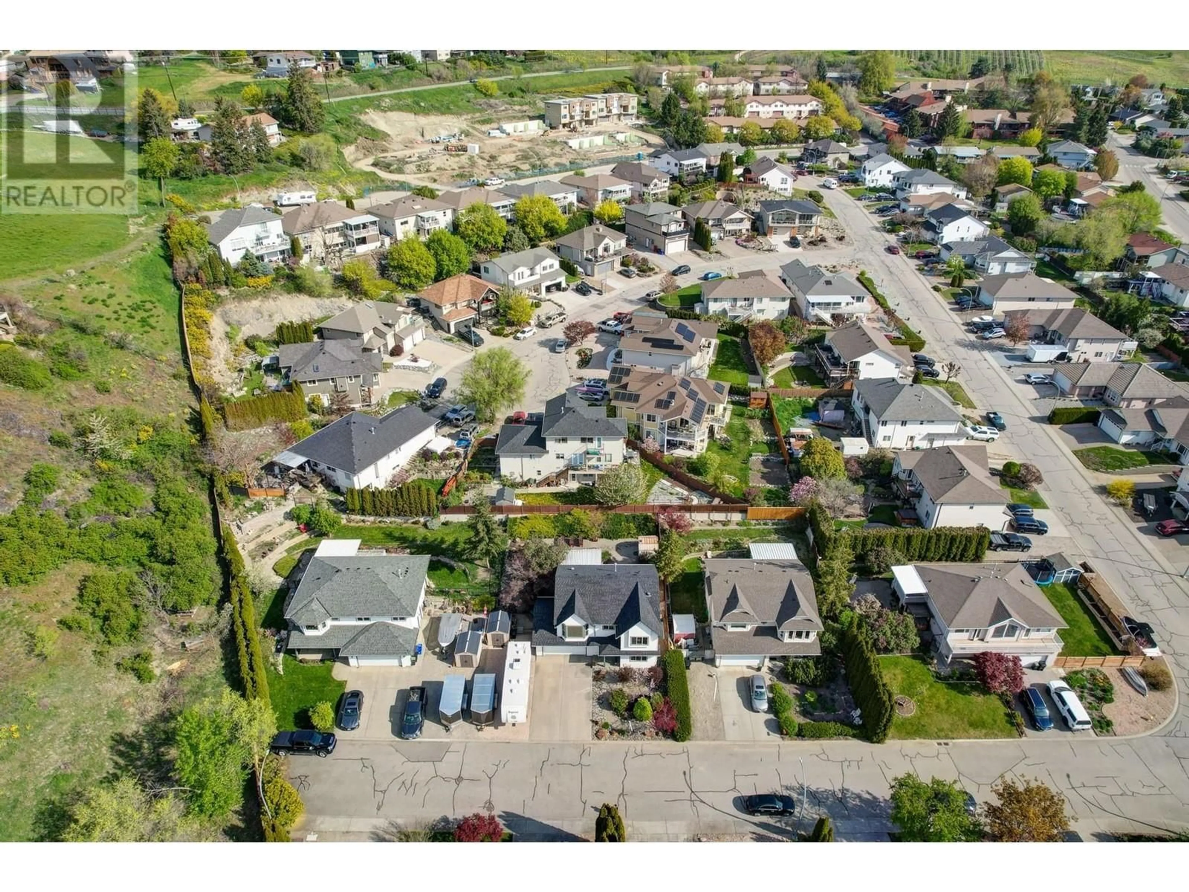 A pic from outside/outdoor area/front of a property/back of a property/a pic from drone, street for 5805 RICHFIELD DRIVE, Vernon British Columbia V1H1A7