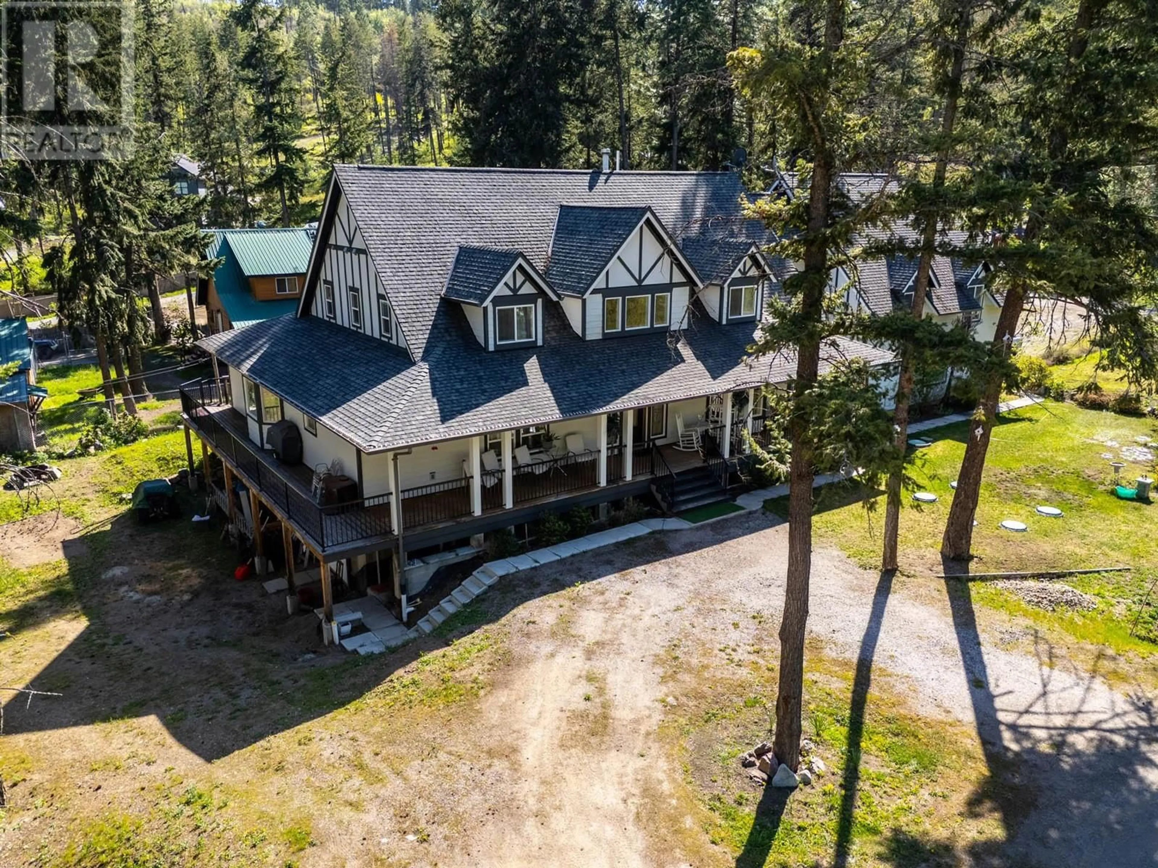 A pic from outside/outdoor area/front of a property/back of a property/a pic from drone, mountain view for 7991 ALPINE ROAD, Kelowna British Columbia V1Z3V8