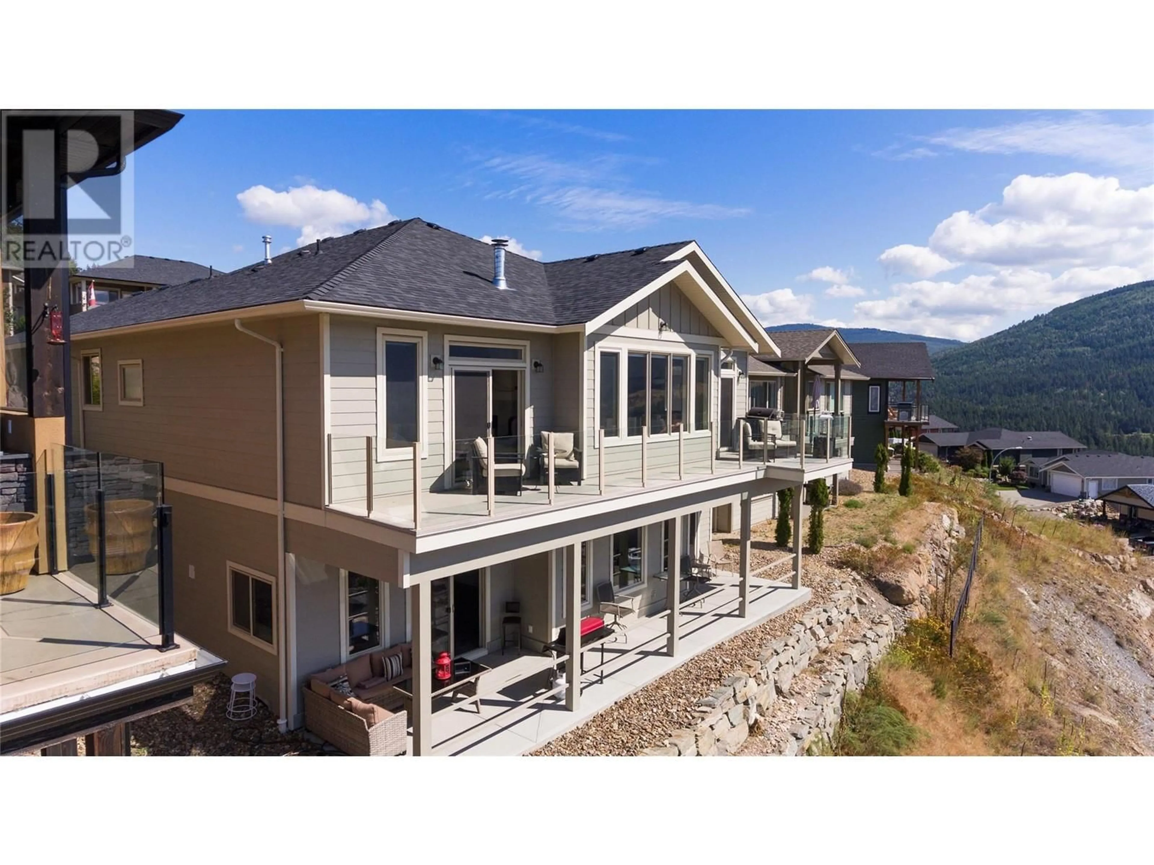 A pic from outside/outdoor area/front of a property/back of a property/a pic from drone, mountain view for 7329 SUNRIDGE ROAD, Vernon British Columbia V1B4C8
