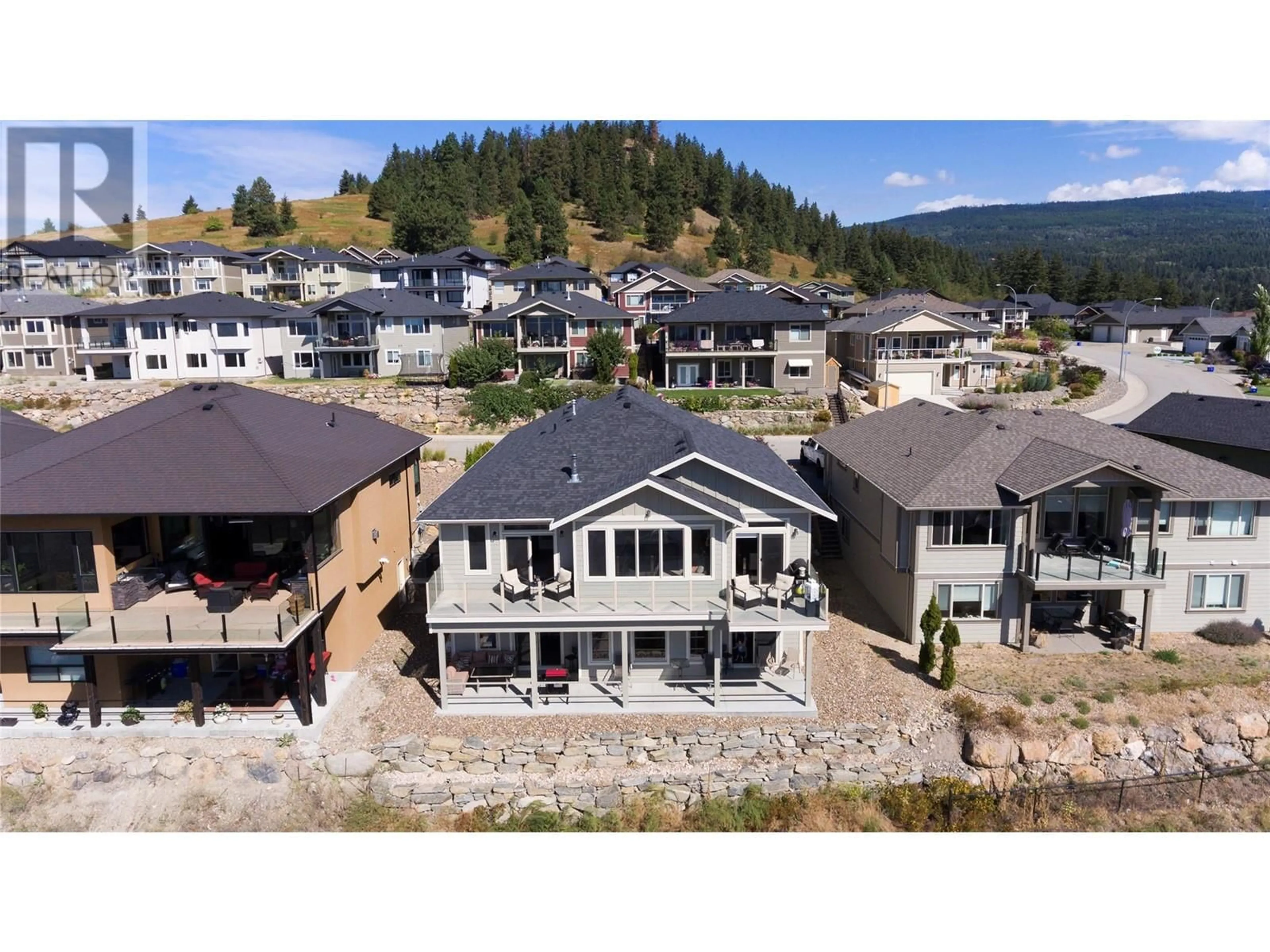 A pic from outside/outdoor area/front of a property/back of a property/a pic from drone, mountain view for 7329 SUNRIDGE ROAD, Vernon British Columbia V1B4C8