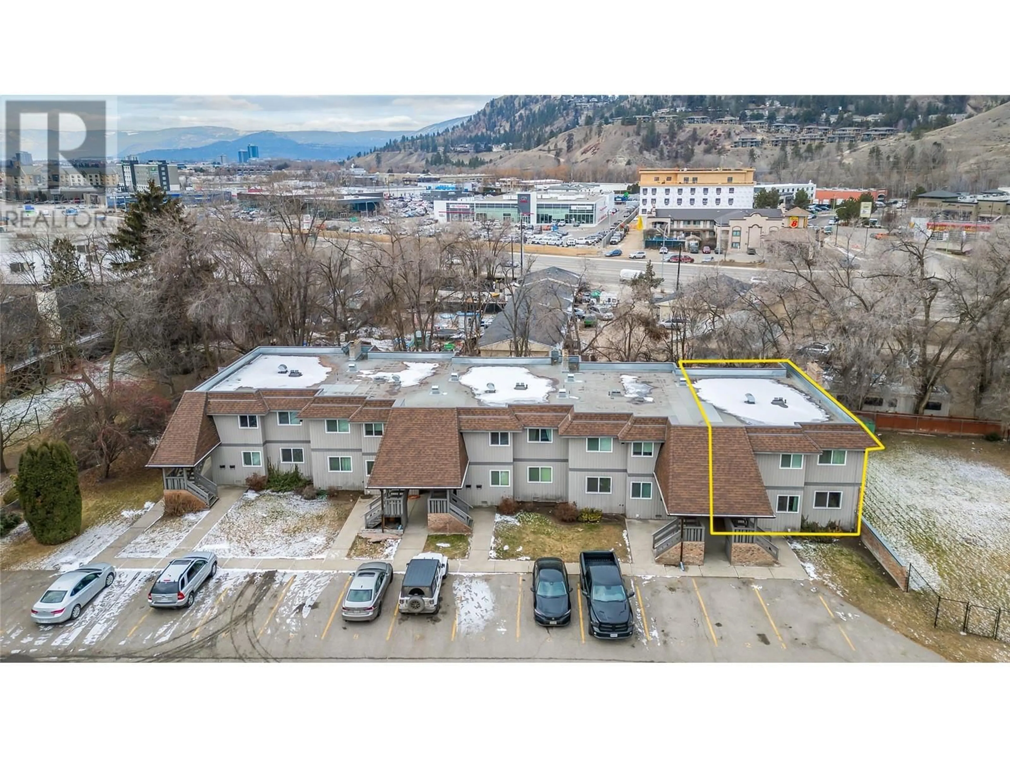 A pic from outside/outdoor area/front of a property/back of a property/a pic from drone, mountain view for 1 - 340 MILLS ROAD, Kelowna British Columbia V1X4G8
