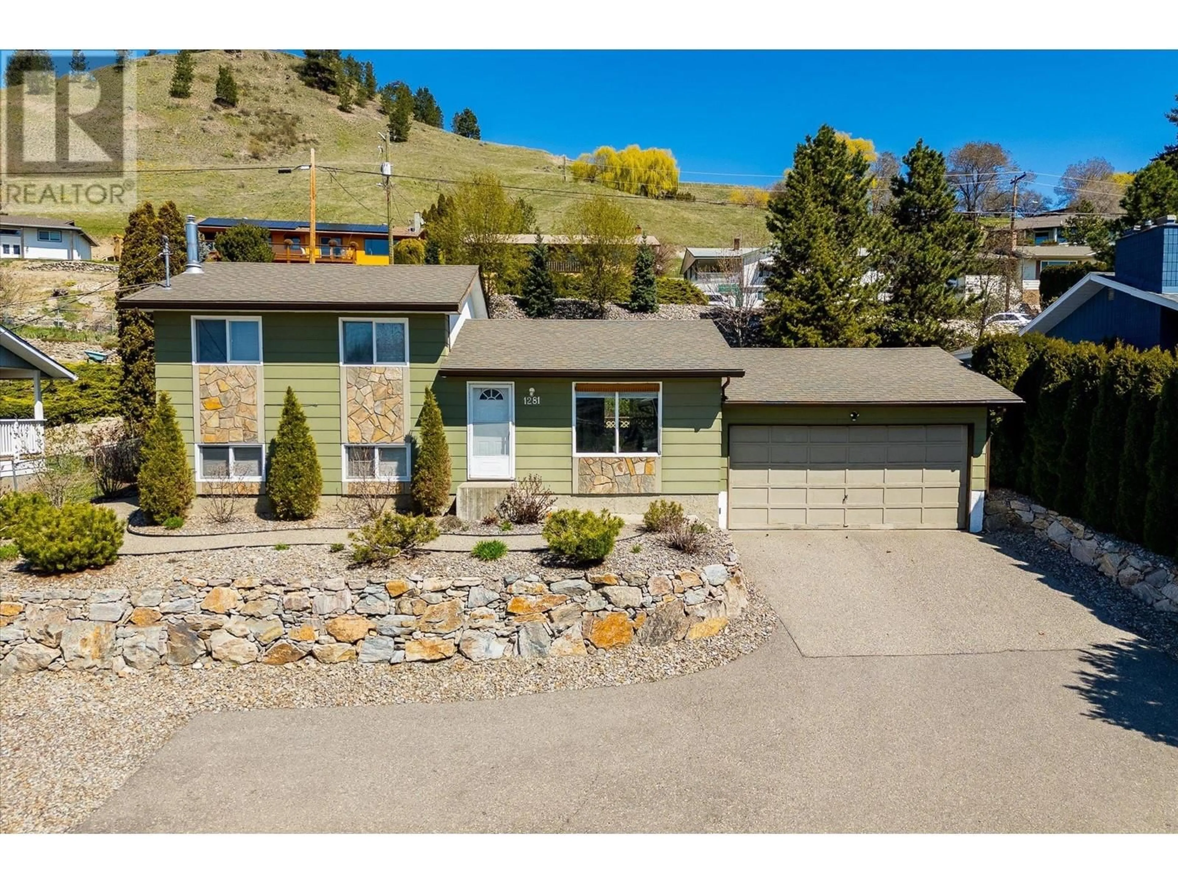 A pic from outside/outdoor area/front of a property/back of a property/a pic from drone, street for 1281 LUND ROAD, Kelowna British Columbia V1P1K9