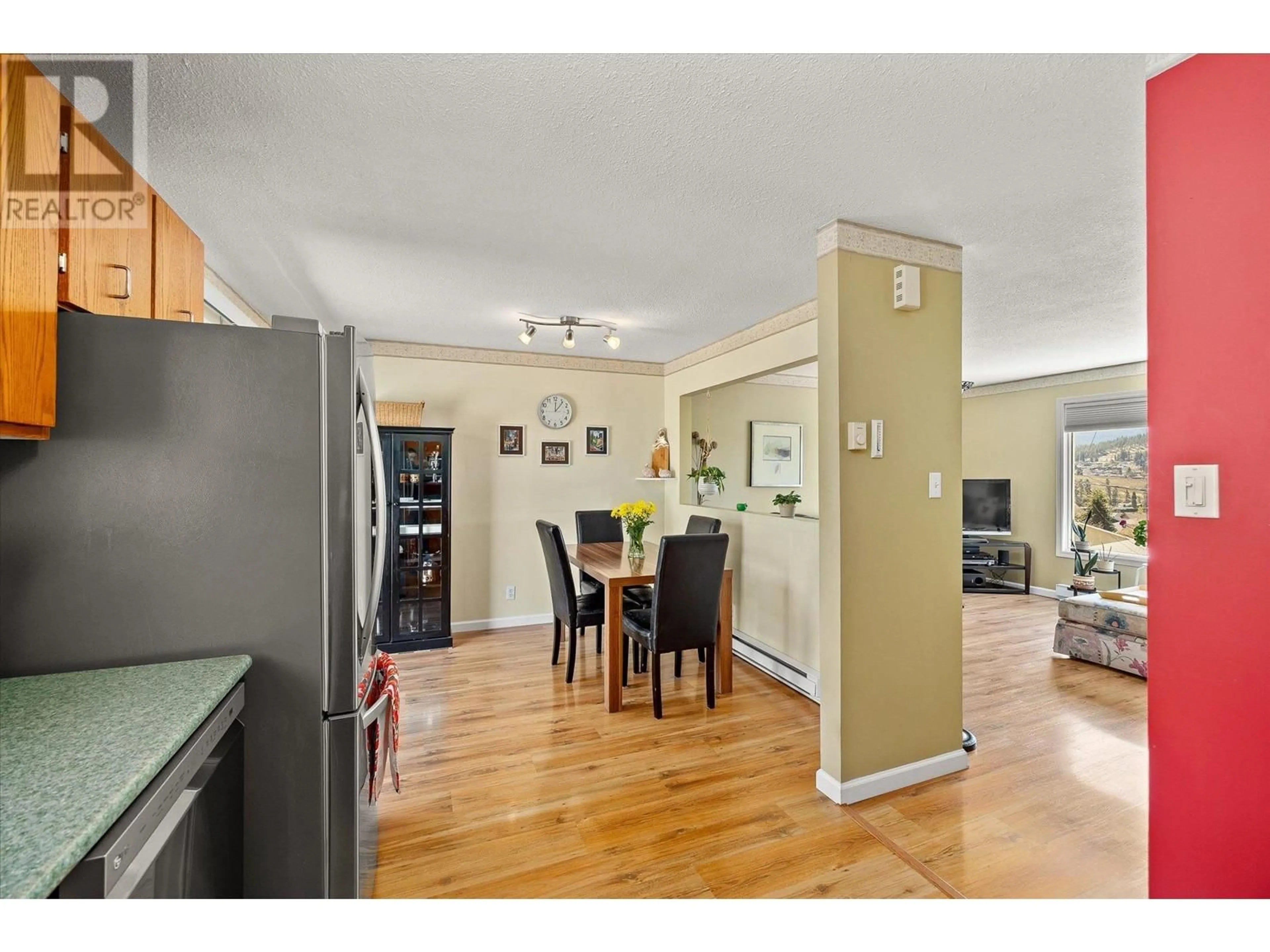 Open concept kitchen, wood/laminate floor for 1281 LUND ROAD, Kelowna British Columbia V1P1K9