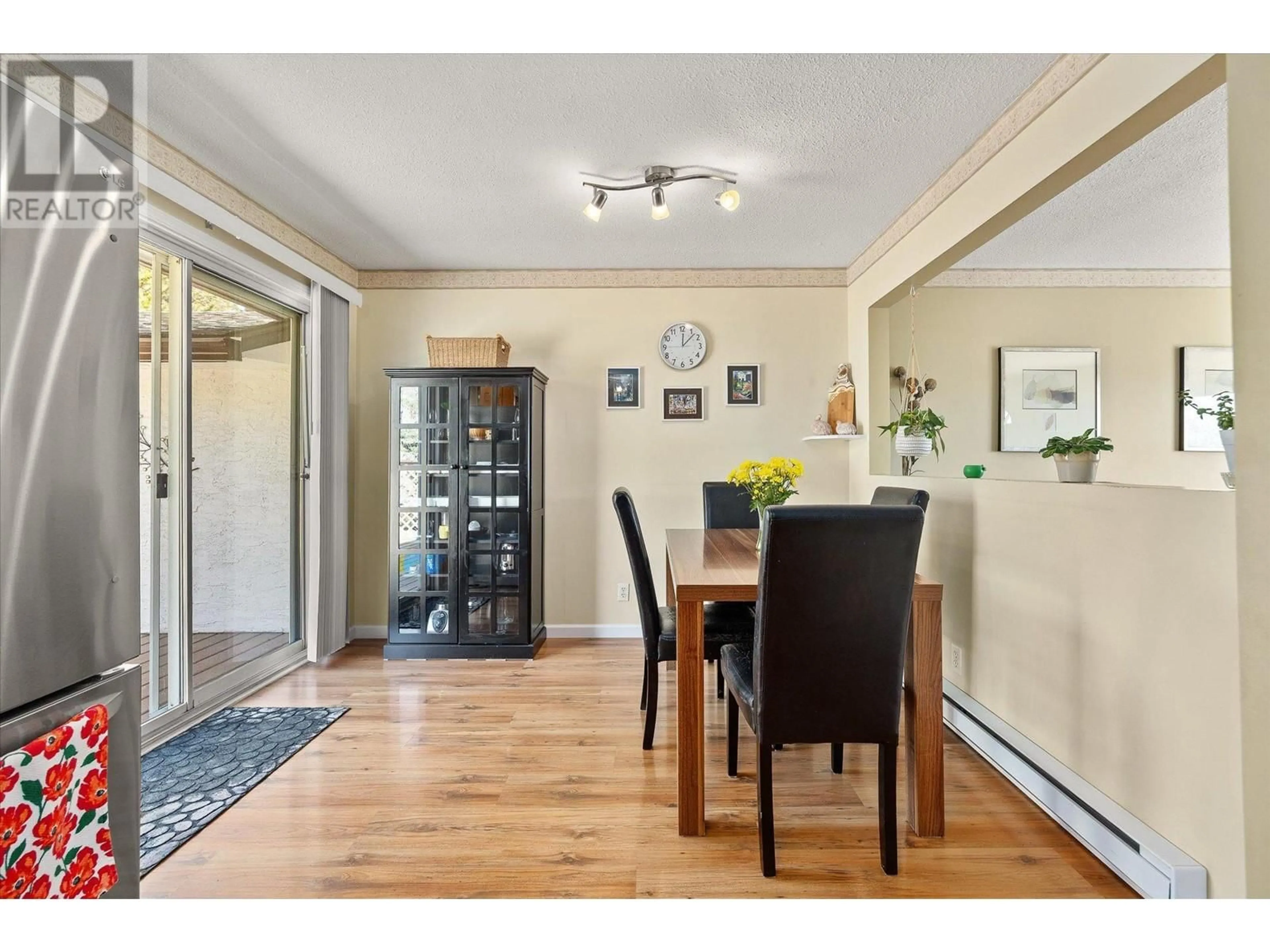 Dining room, wood/laminate floor for 1281 LUND ROAD, Kelowna British Columbia V1P1K9