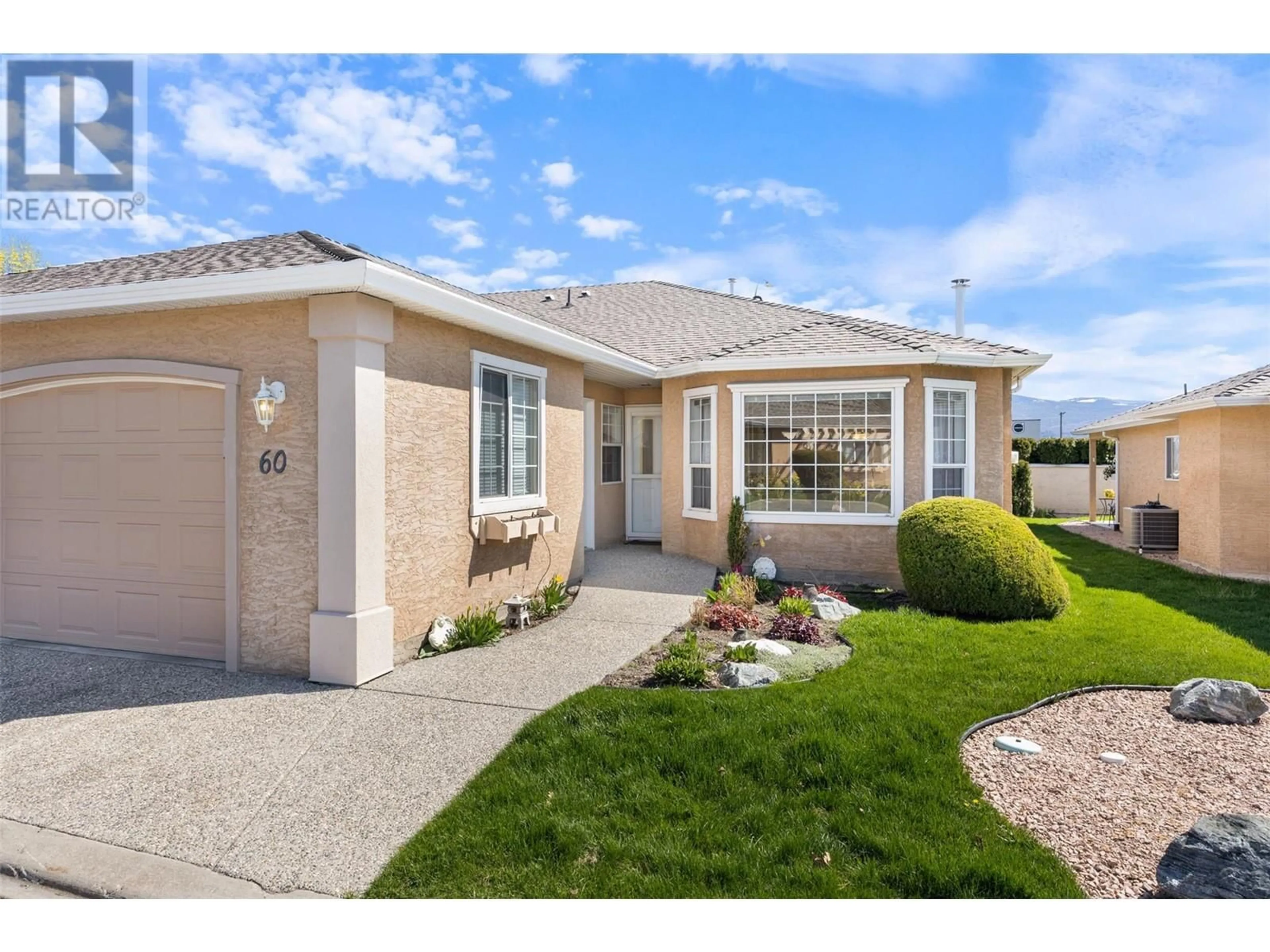 Home with vinyl exterior material, street for 60 - 2250 LOUIE DRIVE, Westbank British Columbia V4T2M6