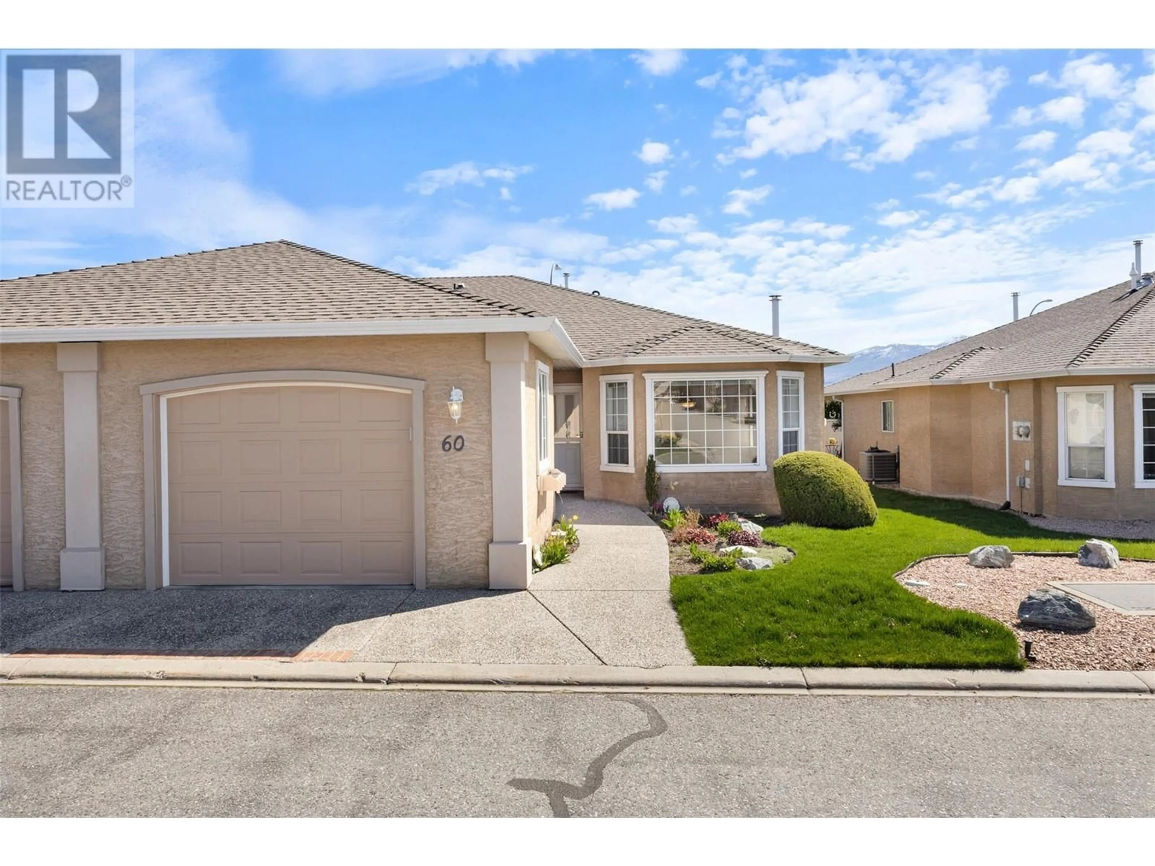 Home with vinyl exterior material, street for 60 - 2250 LOUIE DRIVE, Westbank British Columbia V4T2M6