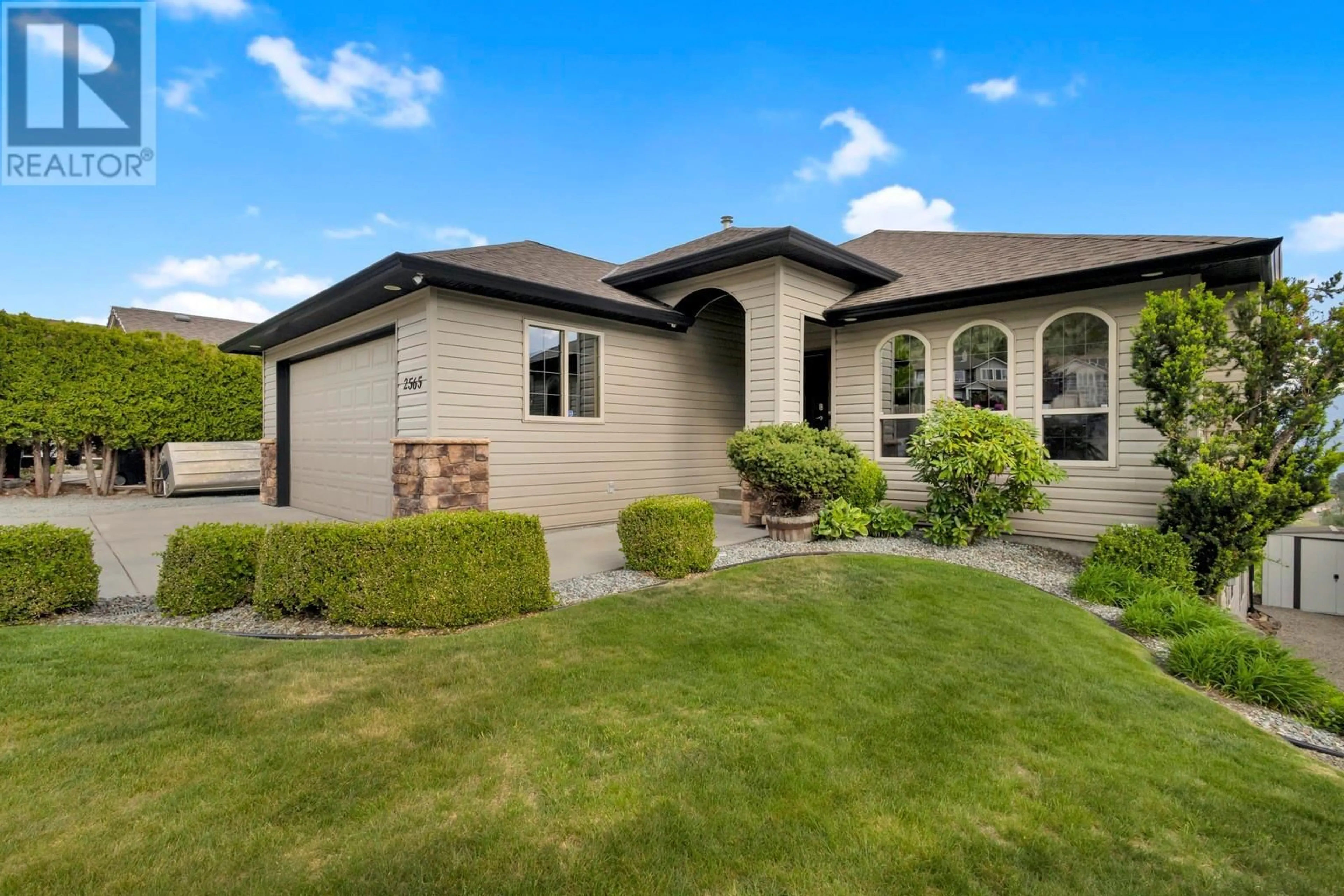 Home with vinyl exterior material, street for 2565 COPPER RIDGE DRIVE, West Kelowna British Columbia V4T2X6